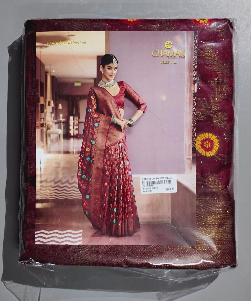 Opulent Maroon Silk Saree with Intricate Floral Motifs",
