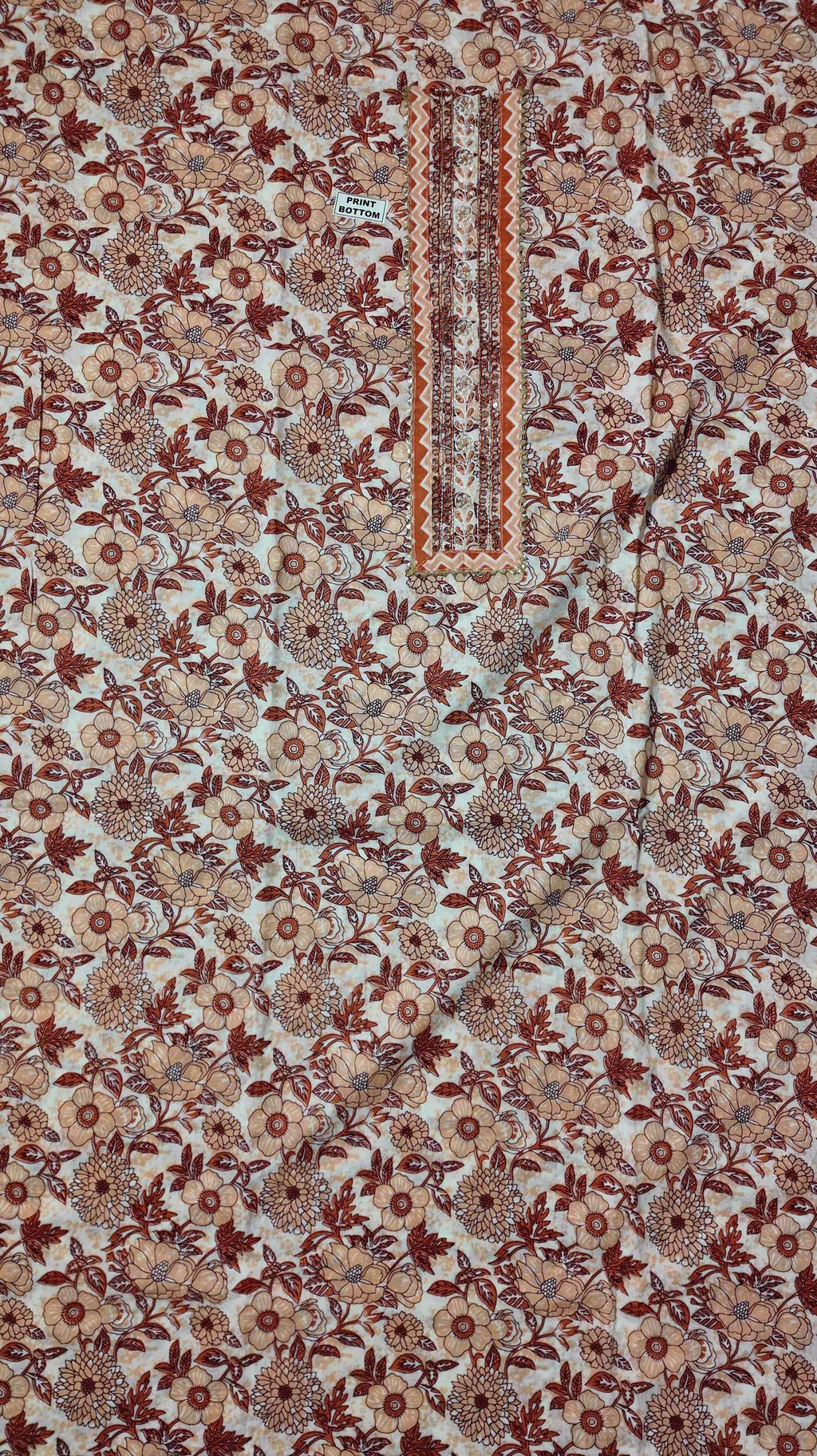Floral Symphony: Unstitched Suit with Playful Patterns