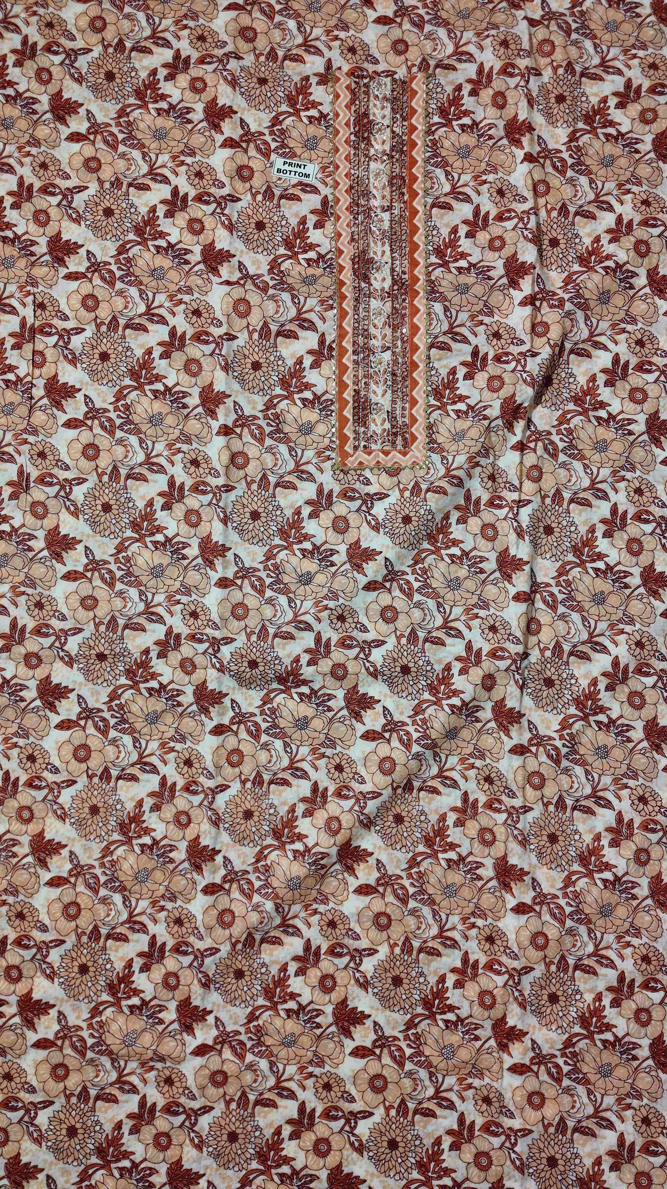 Floral Symphony: Unstitched Suit with Playful Patterns
