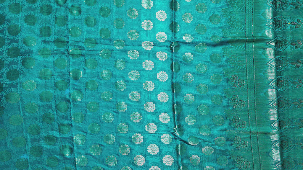 Teal Radiance: Handcrafted Banarasi Silk Saree",