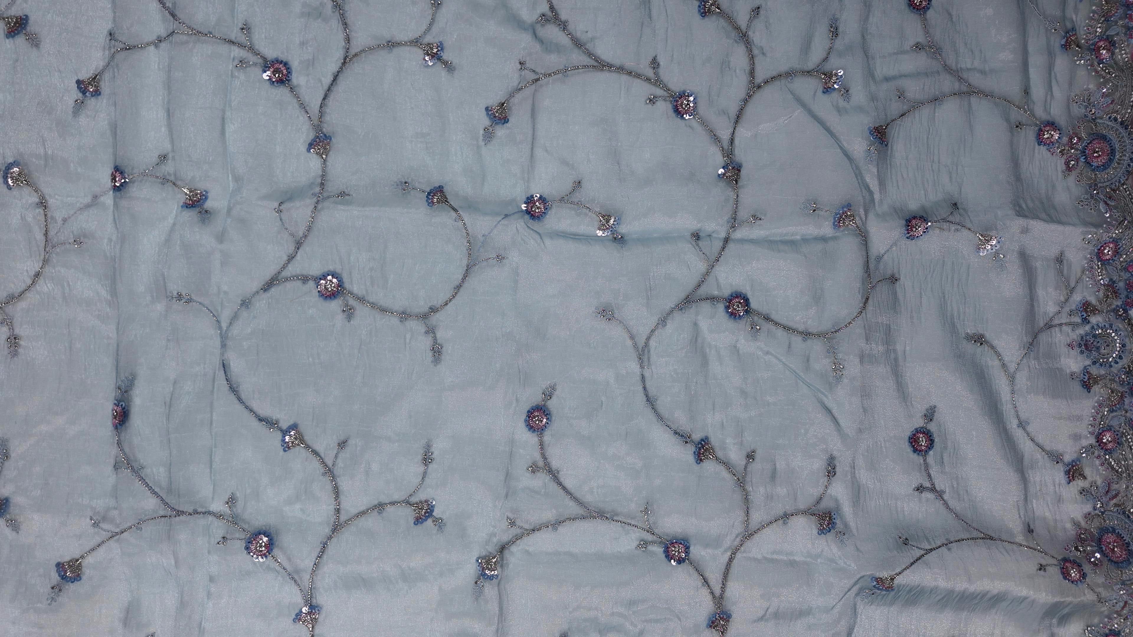 Whispering Silver Blossom Embroidered Saree",