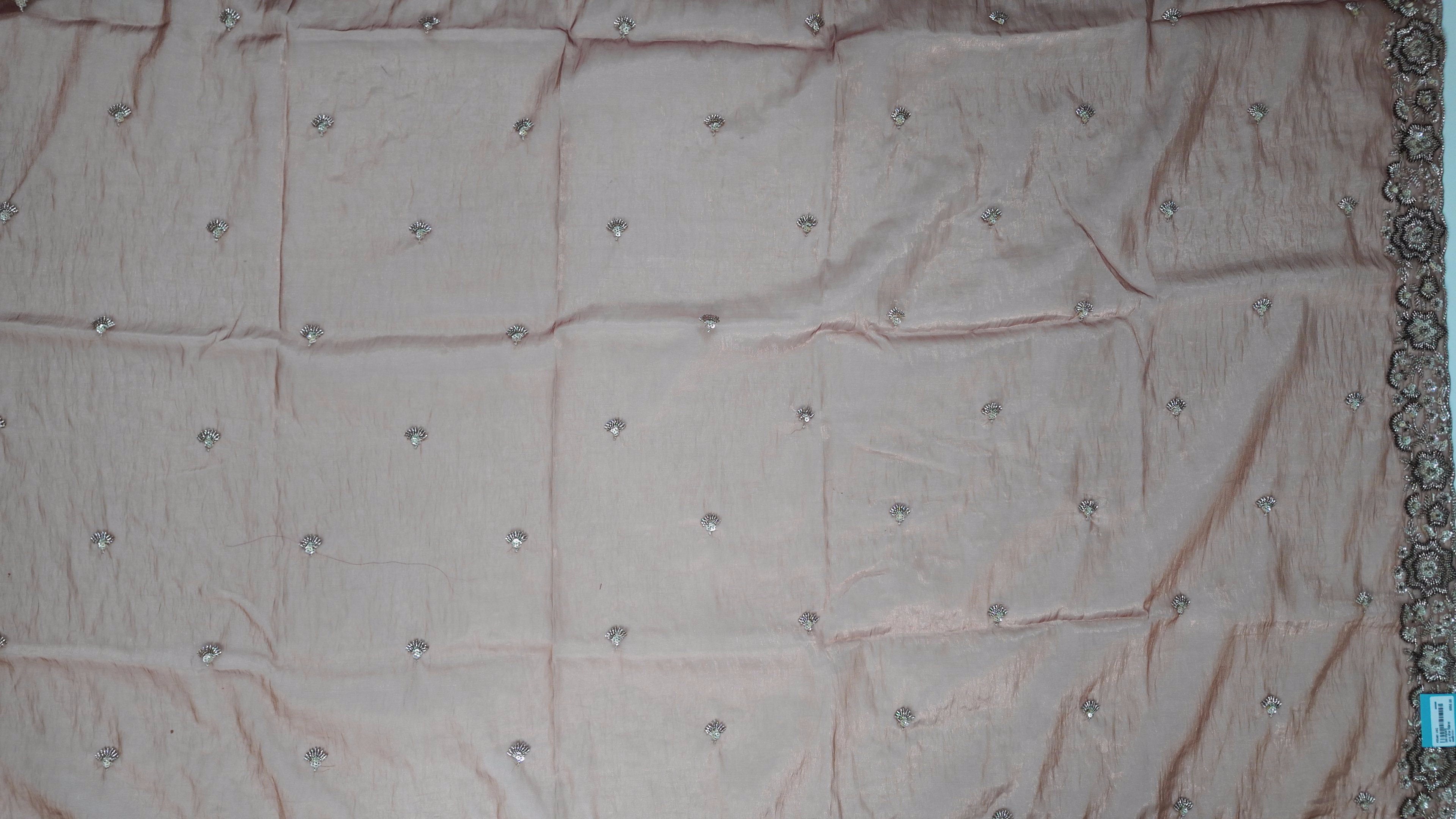 Embroidered Rust Silk Saree with Intricate Metallic Threadwork",