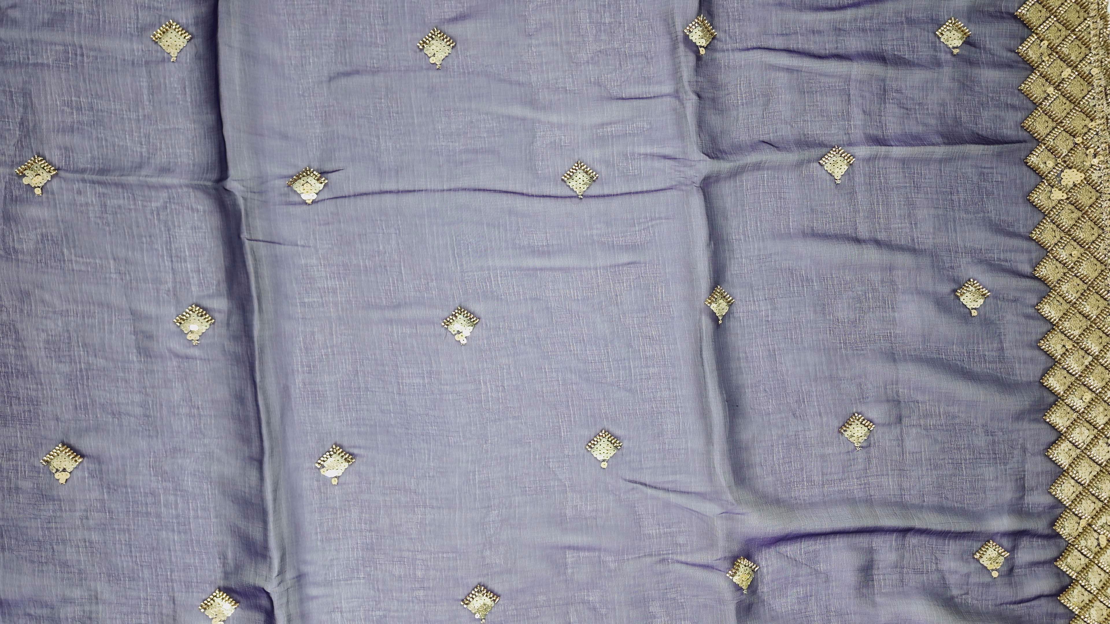 Royal Indigo Saree with Intricate Sequin Detailing",