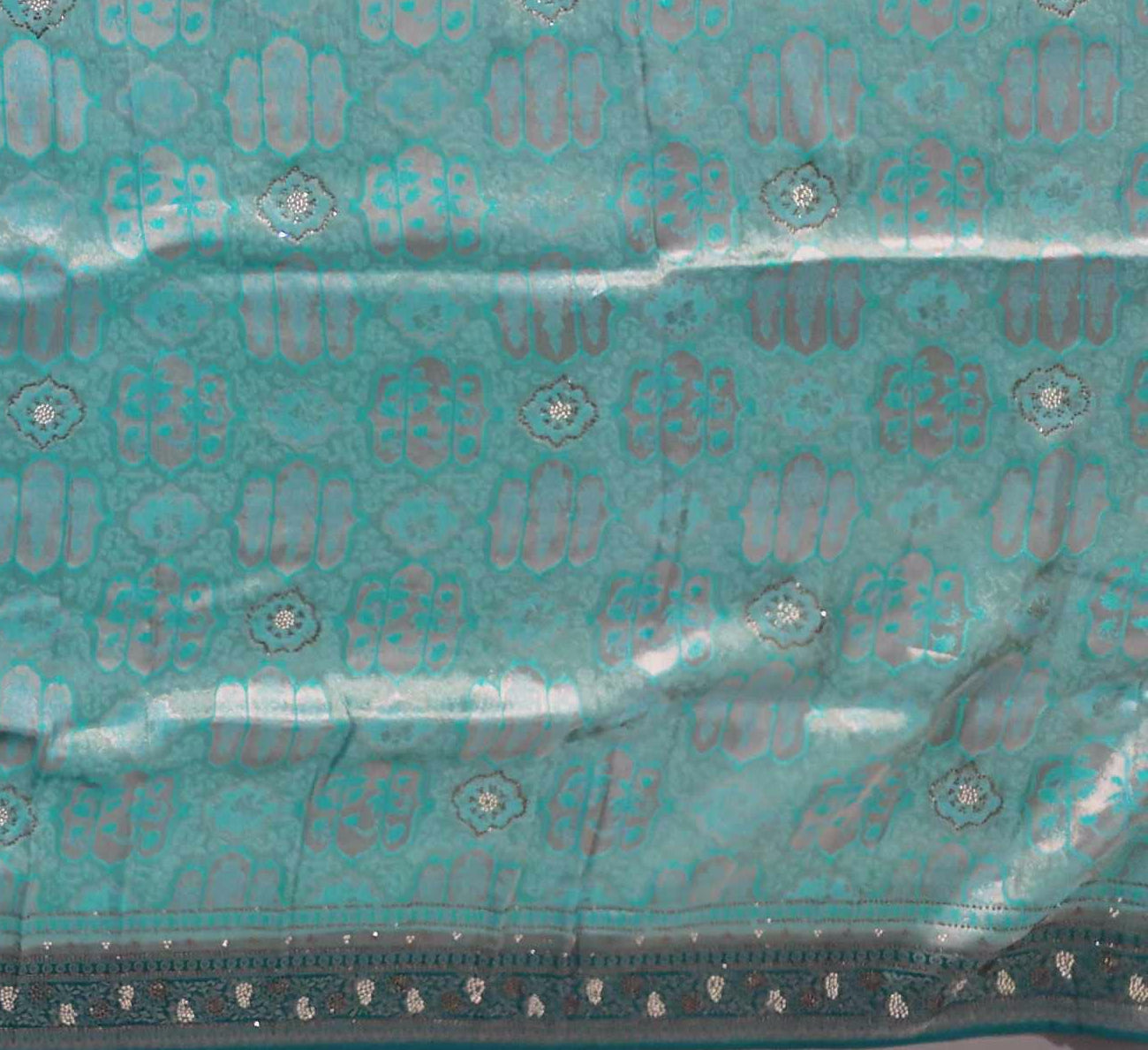 Icy Teal Ethnic Charm: Intricate Patterned Saree",