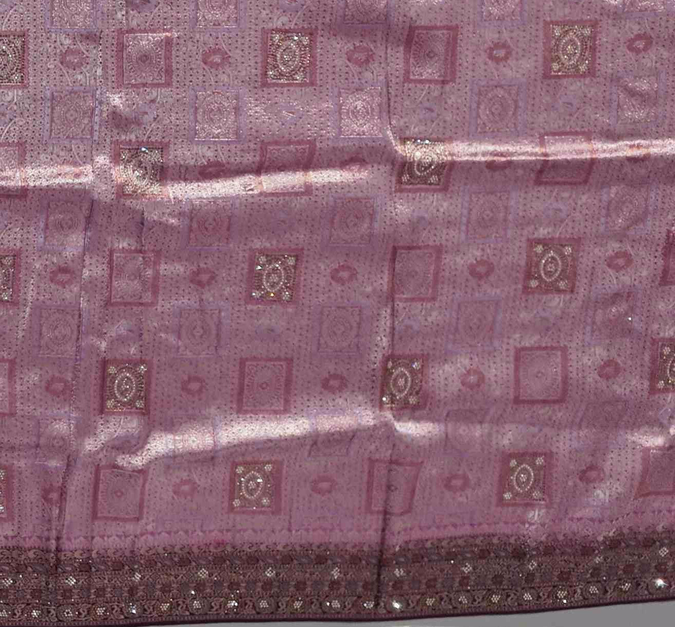 Radiant Maroon Tapestry Saree with Intricate Patterns",