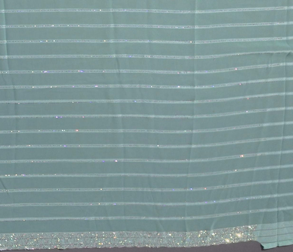 Aqua Luster: Luxe Striped Shimmer Saree",