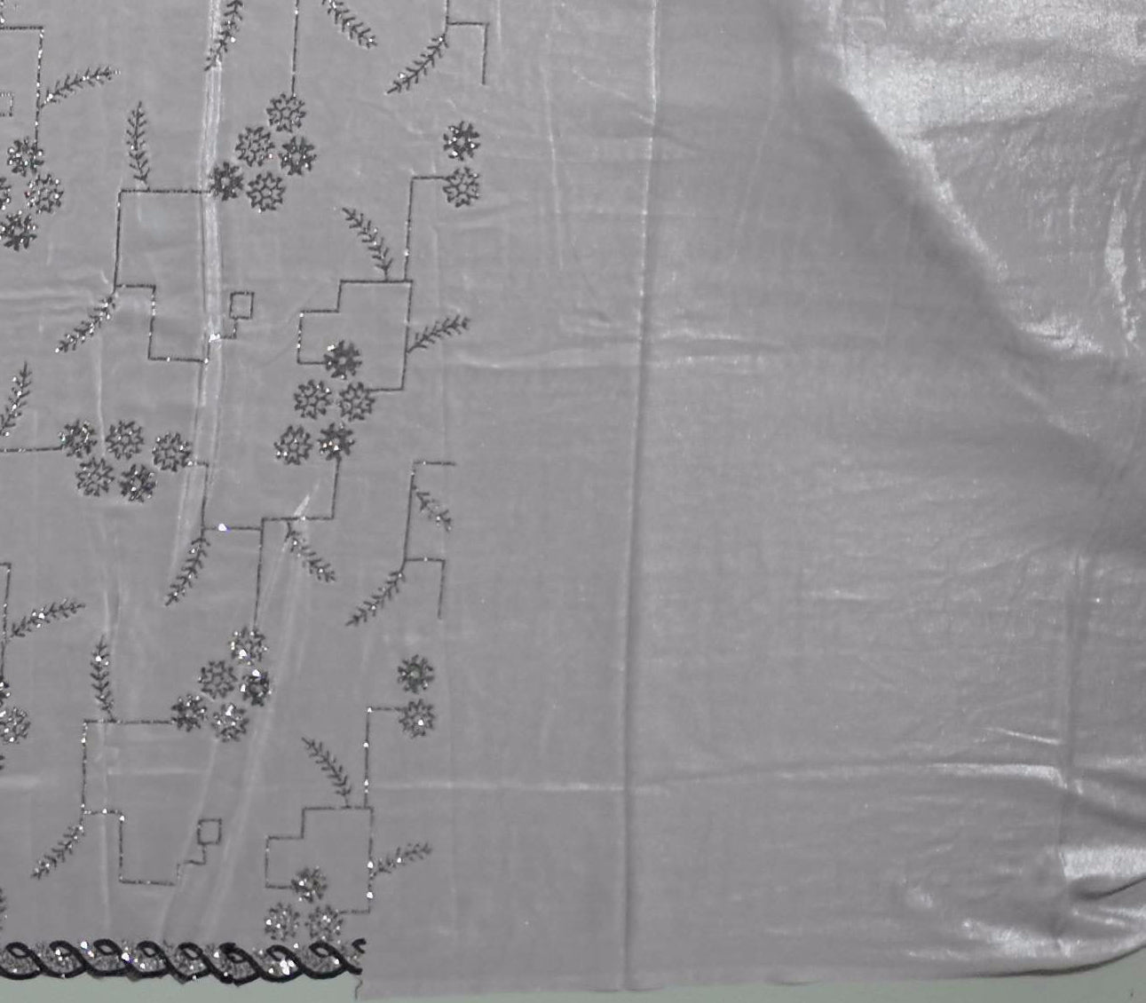 Graceful Glimmer: Lustrous Gray Embellished Saree",