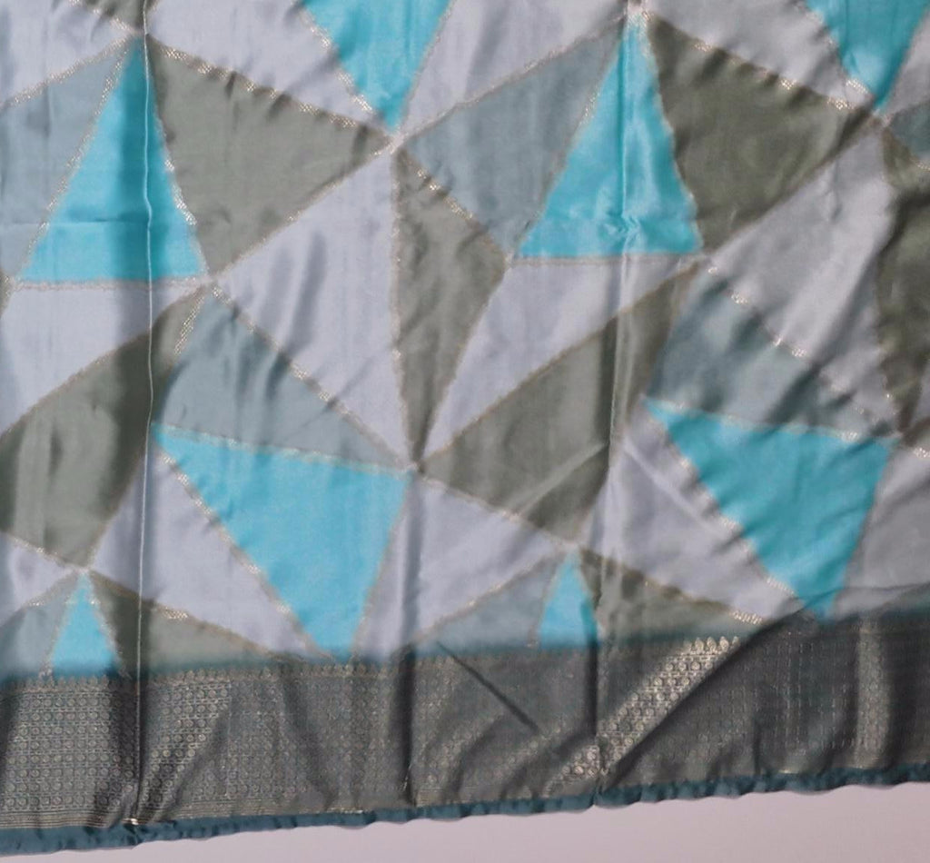 Seafoam Dreams: Luxurious Silk Saree with Intricate Motifs",