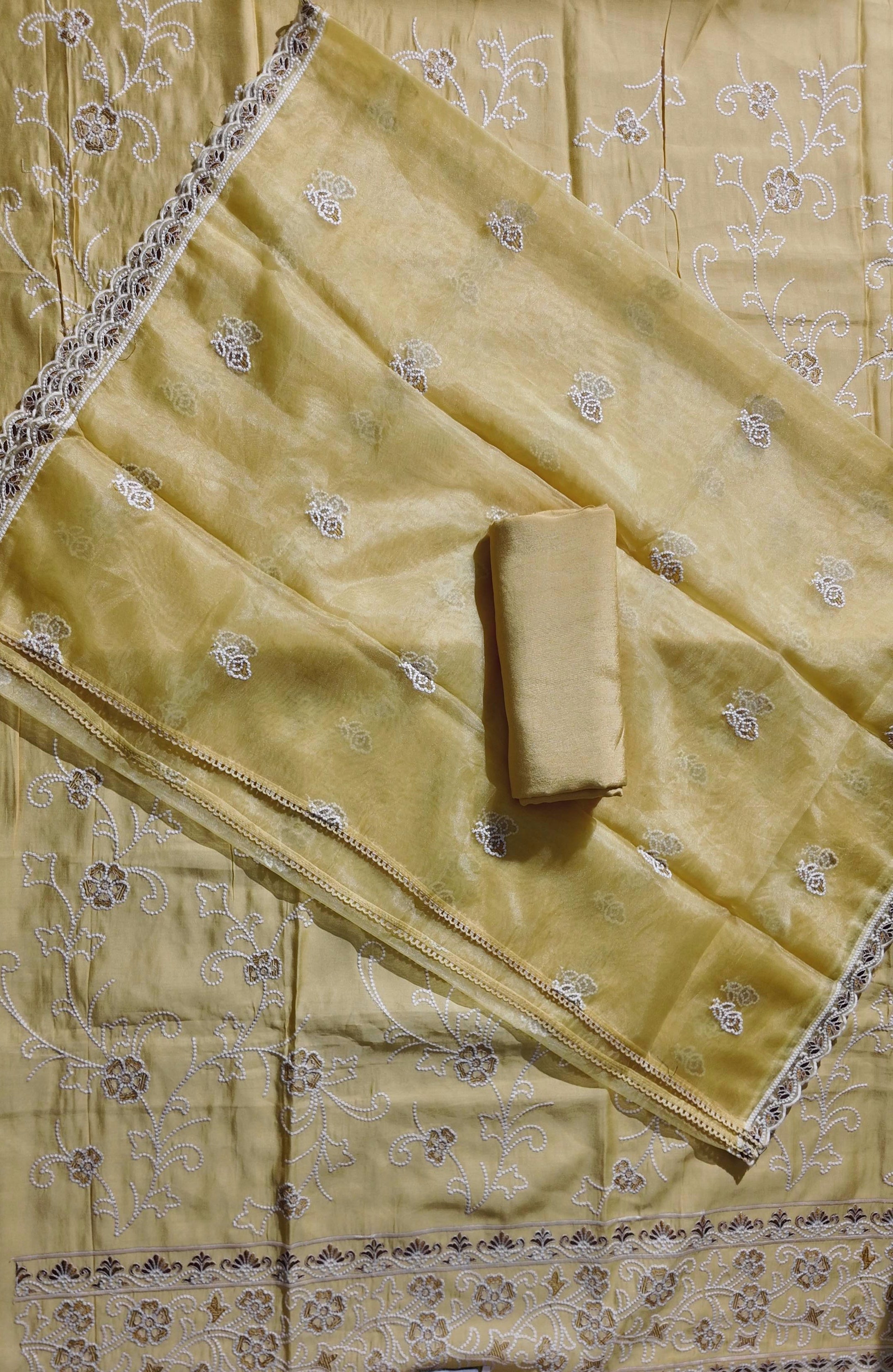 Sun-Kissed Charm: Exquisite Floral Embroidered Unstitched Suit",