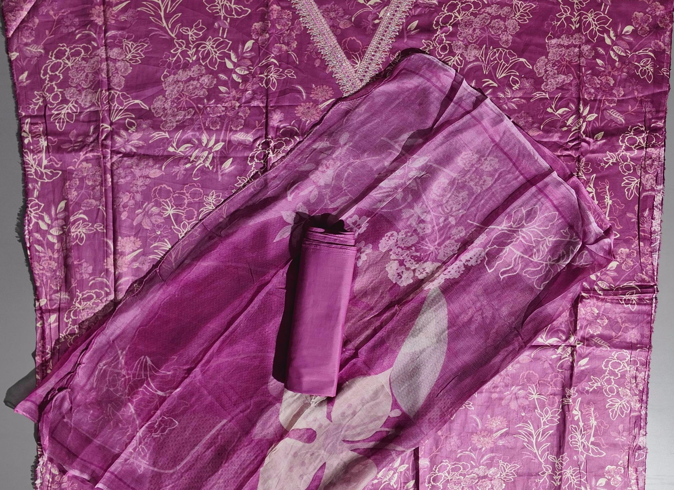 Vibrant Floral Unstitched Suit: Celebrate in Style",