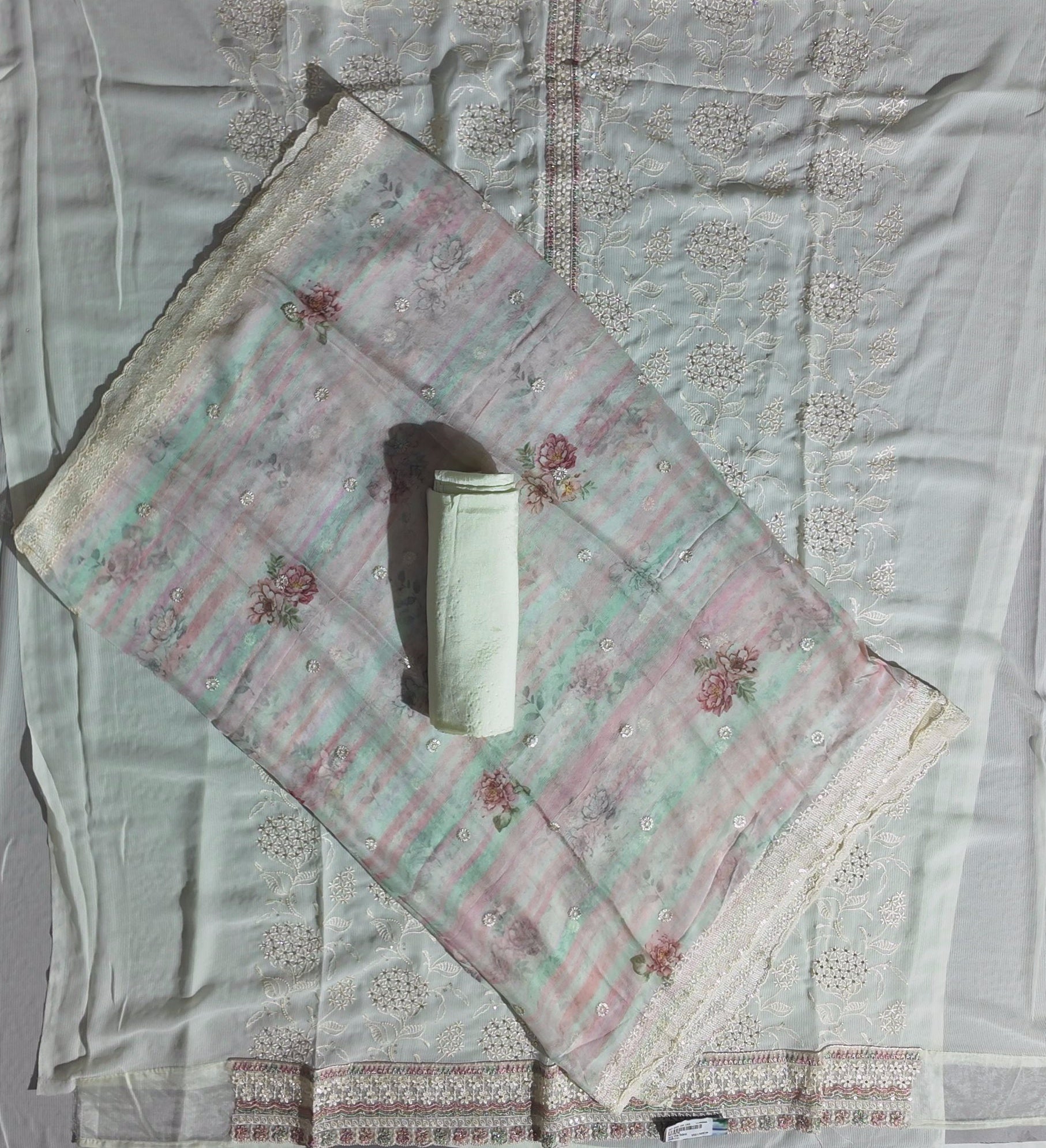 Blossoming Ivory Charm: Unstitched Suit for Every Occasion",