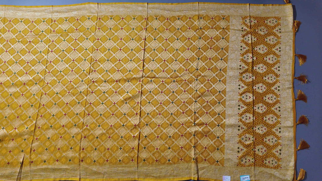 Radiant Mustard Unstitched Suit with Intricate Motifs",