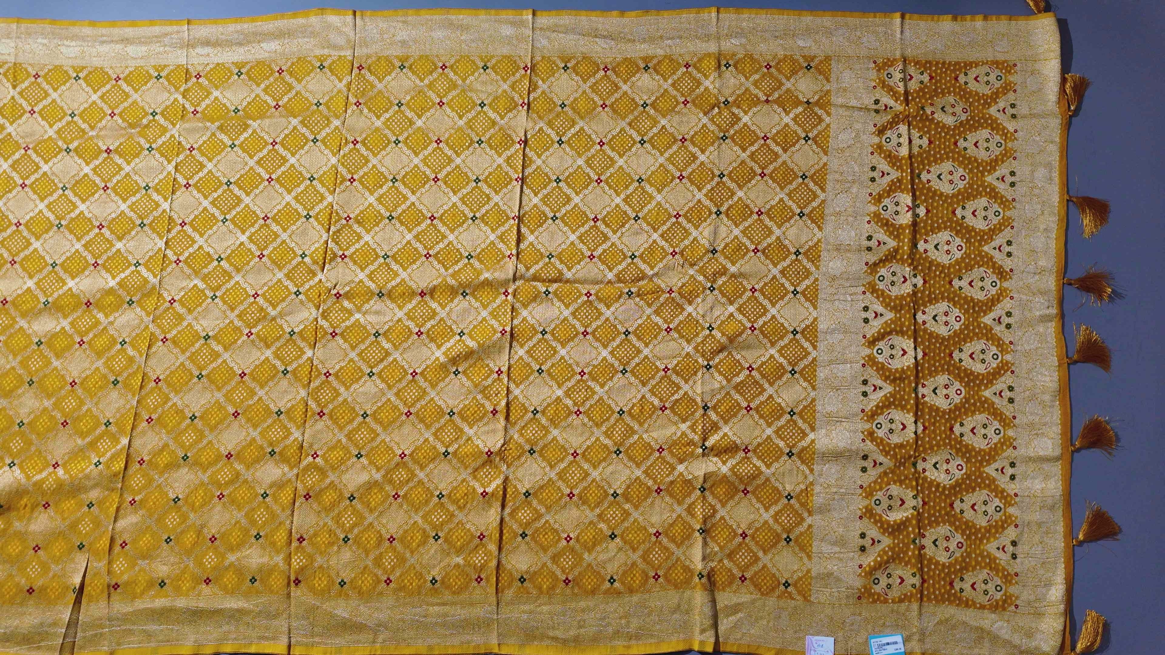 Radiant Mustard Unstitched Suit with Intricate Motifs",