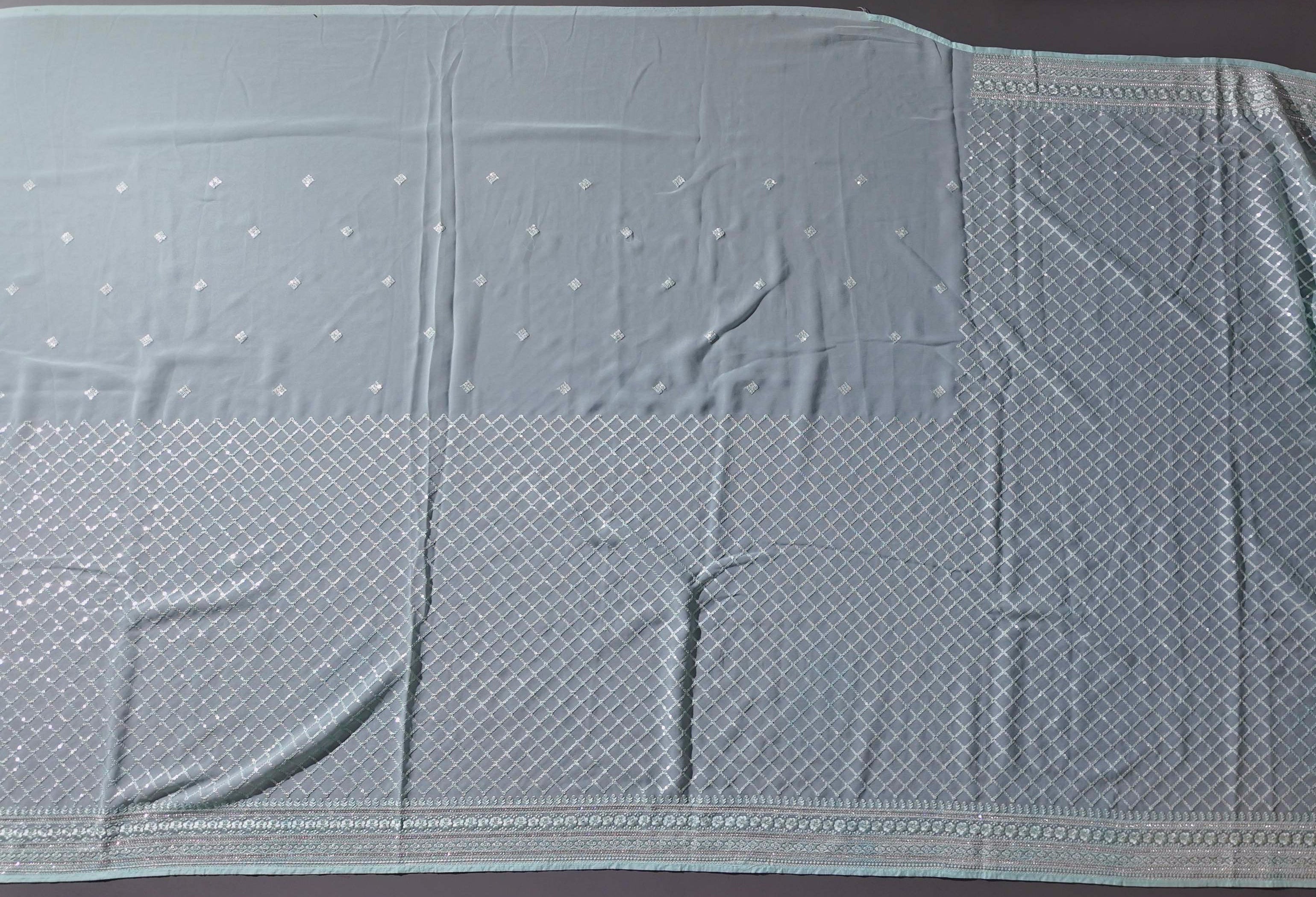 Mint Grace: Artfully Crafted Unstitched Suit Fabric",