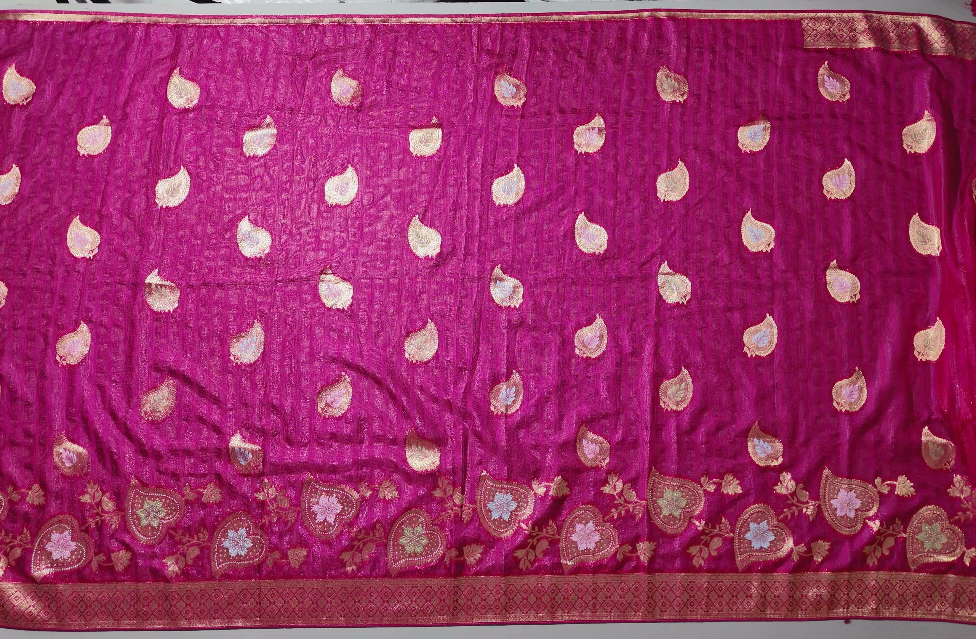 Opulent Ruby Red Saree with Intricate Golden Embroidery",