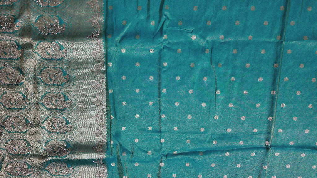 Luxe Teal Heritage Saree with Intricate Silver Weave",