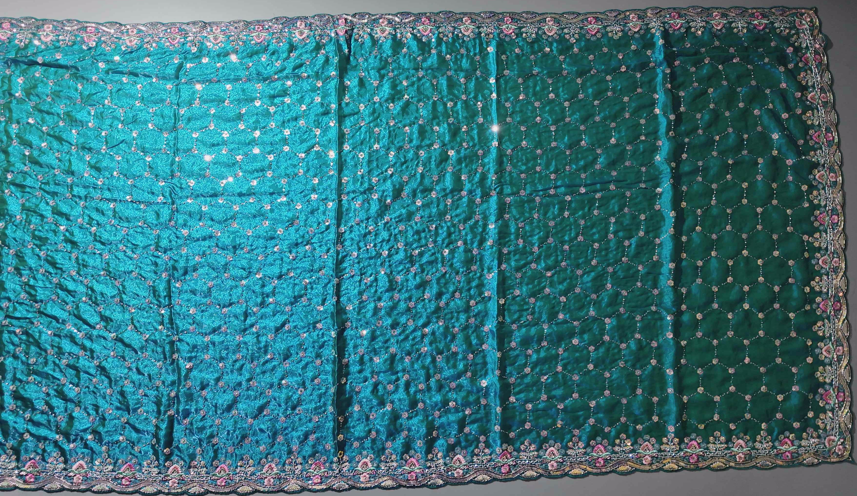 Radiant Teal Dream: Embroidered Floral Extravaganza Saree",