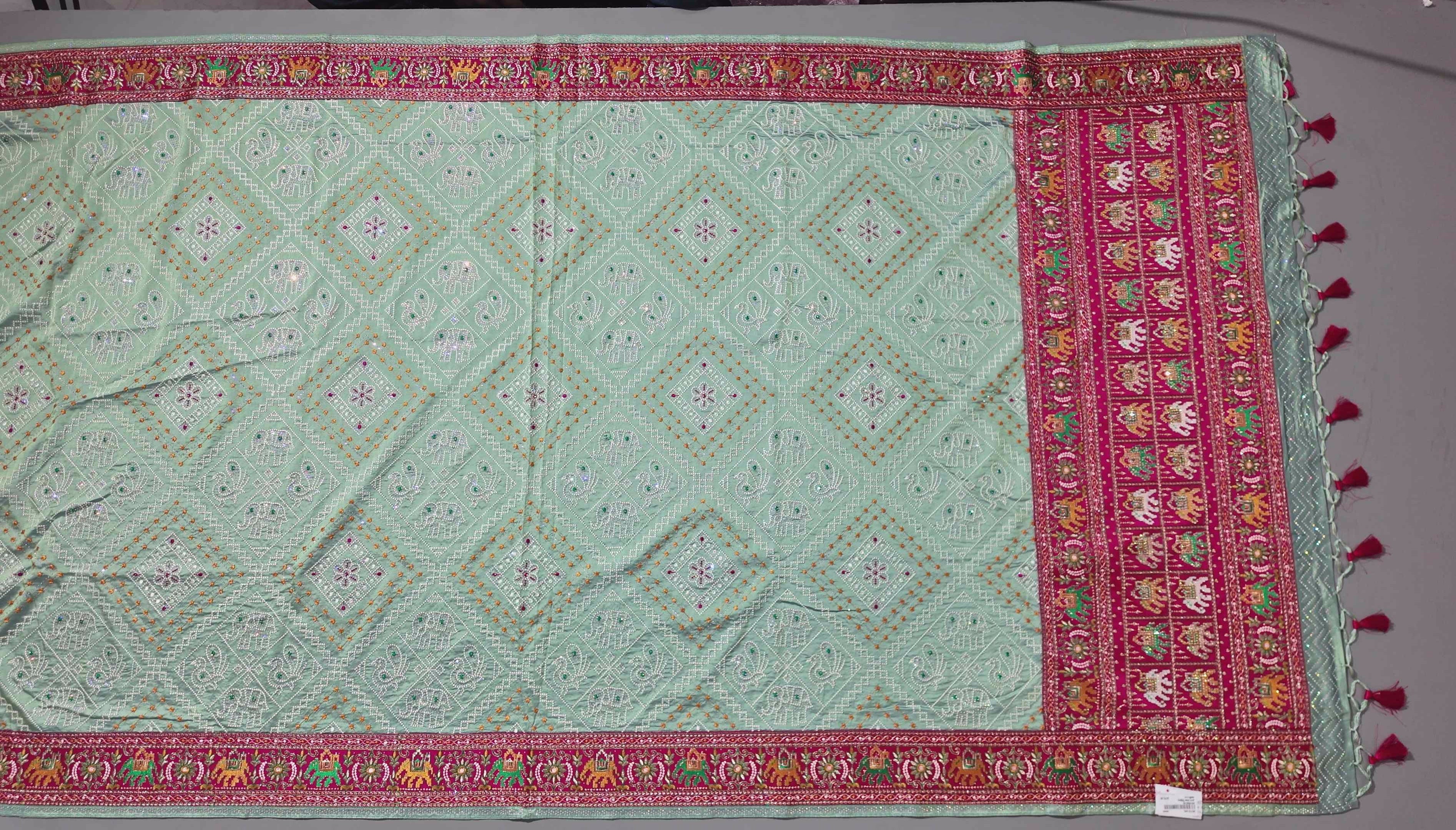 Festive Radiance: Vibrant Embroidered Silk Saree",