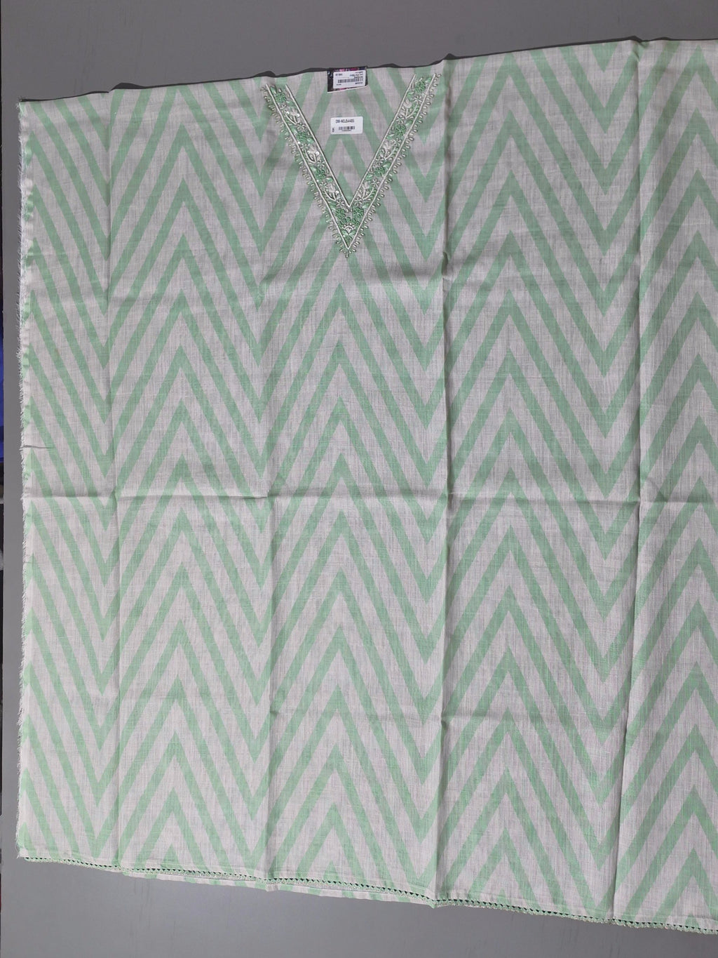 Timeless Charm: Mint Green Unstitched Suit with Embroidered Elegance