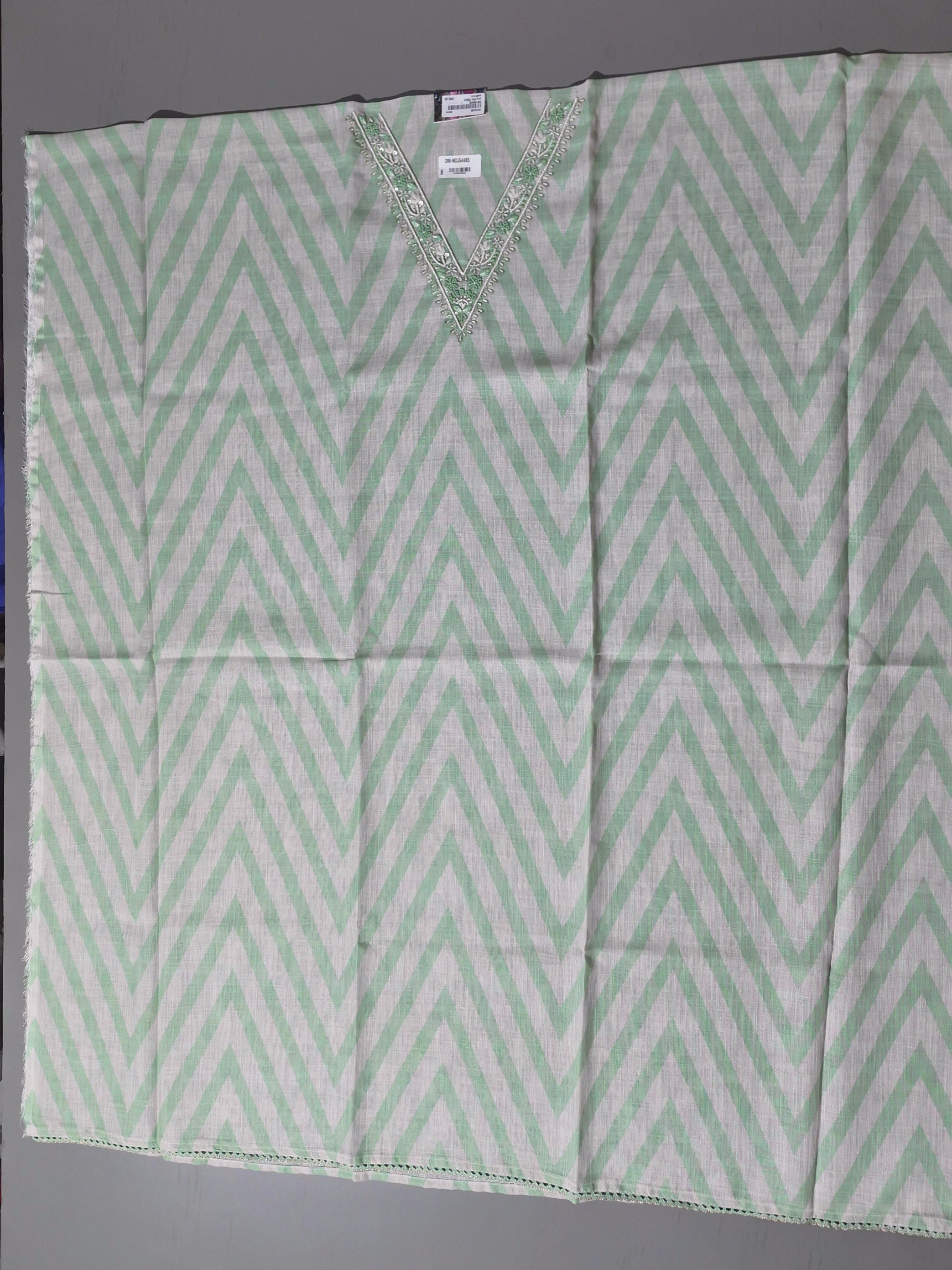 Timeless Charm: Mint Green Unstitched Suit with Embroidered Elegance