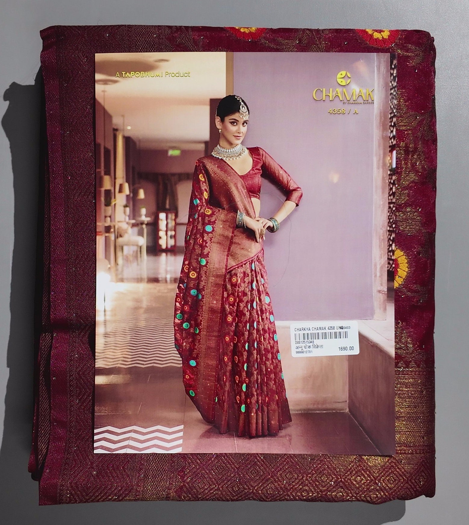 Opulent Maroon Silk Saree with Intricate Floral Motifs",