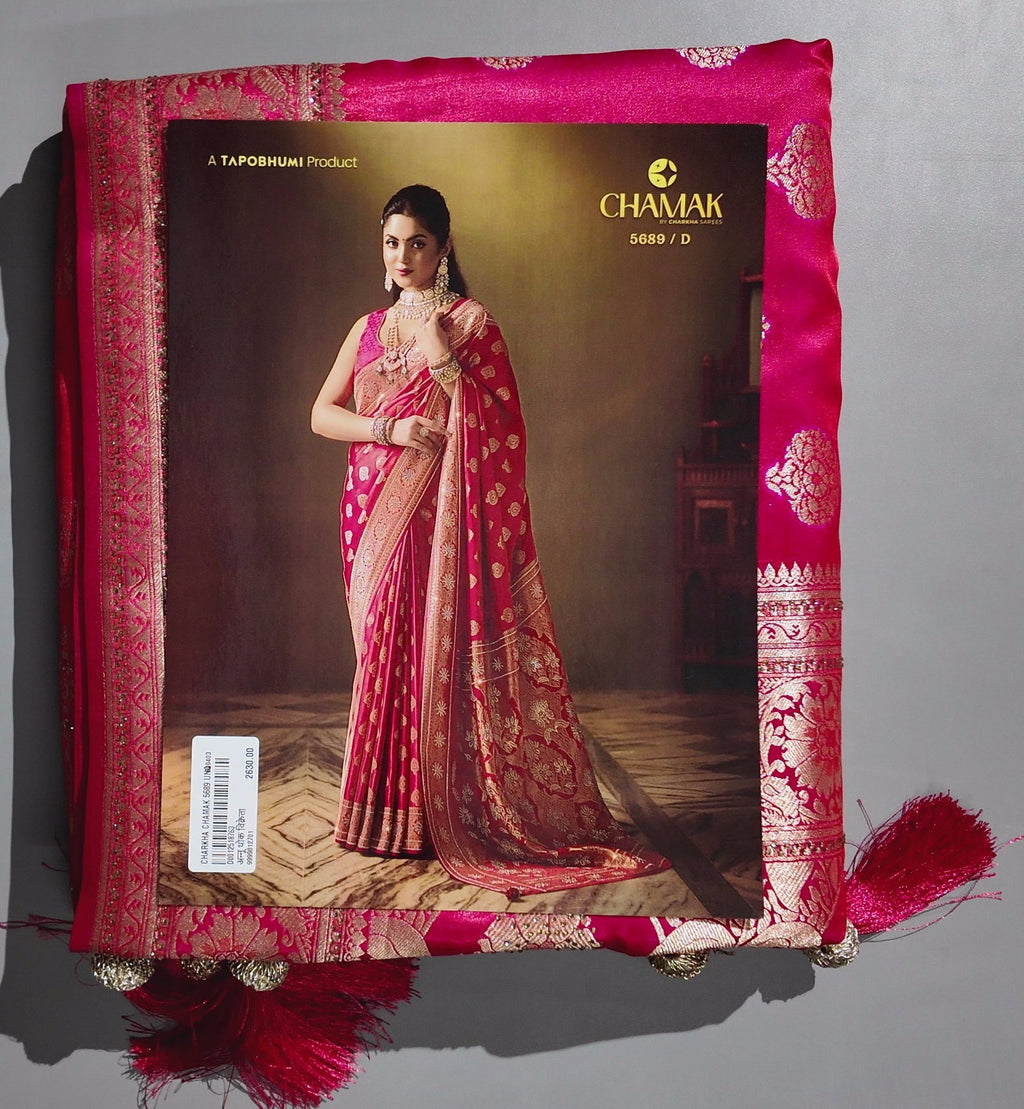 Opulent Pink Silk Saree with Intricate Zari Embroidery",