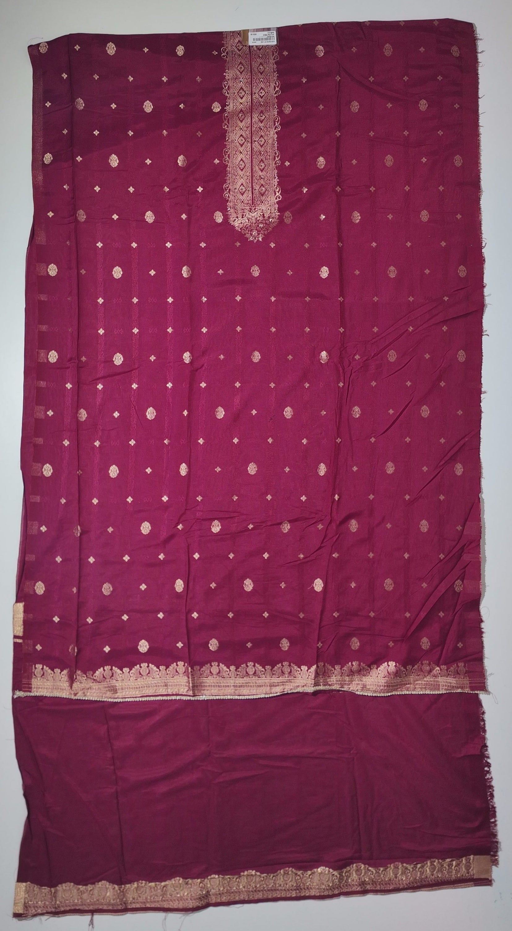 Rich Maroon Unstitched Suit with Intricate Ethnic Patterns