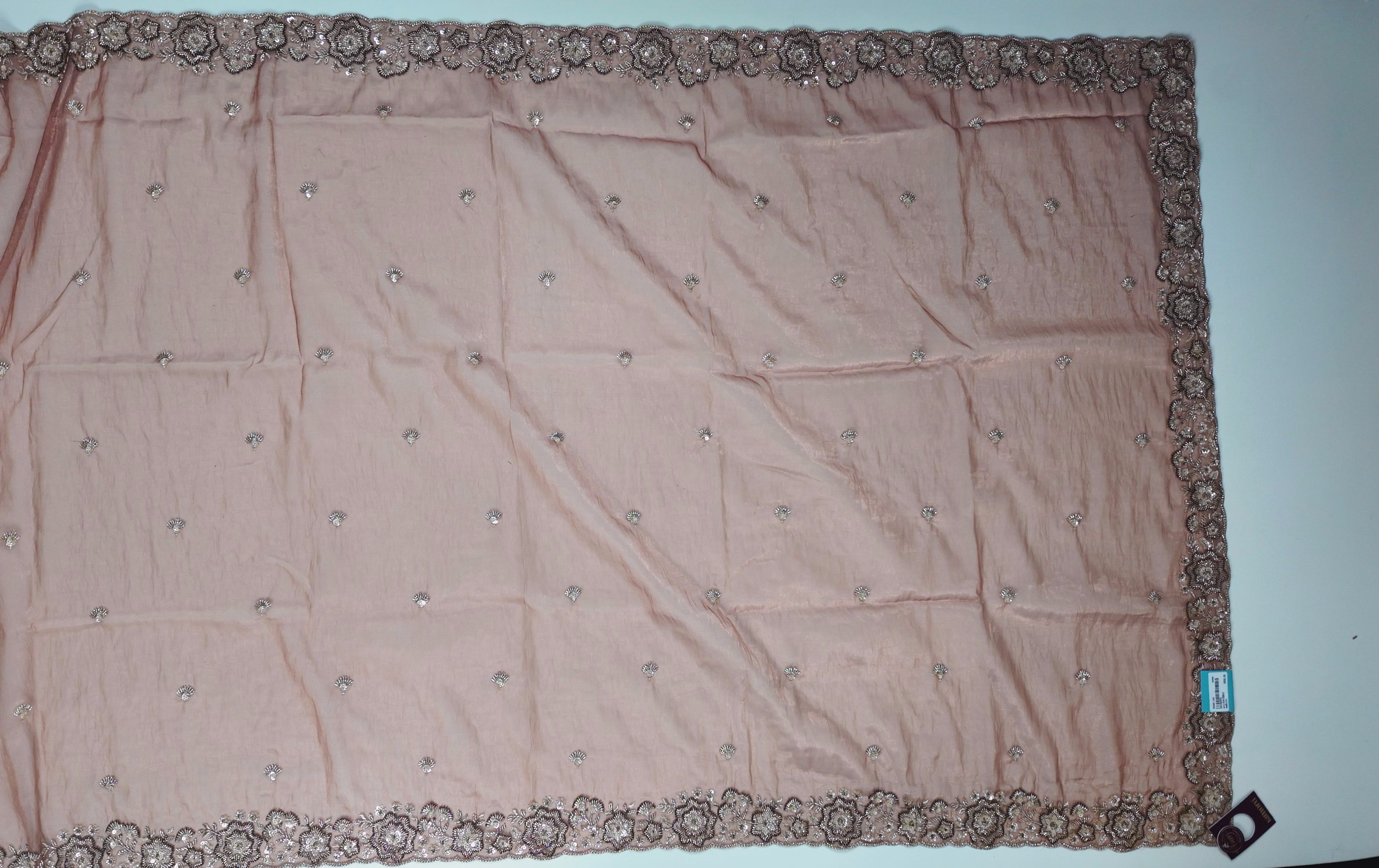 Embroidered Rust Silk Saree with Intricate Metallic Threadwork",