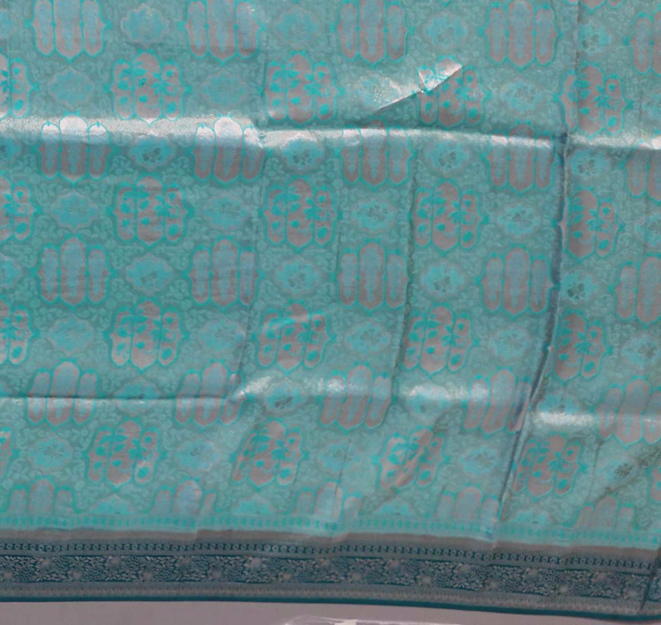 Icy Teal Ethnic Charm: Intricate Patterned Saree",