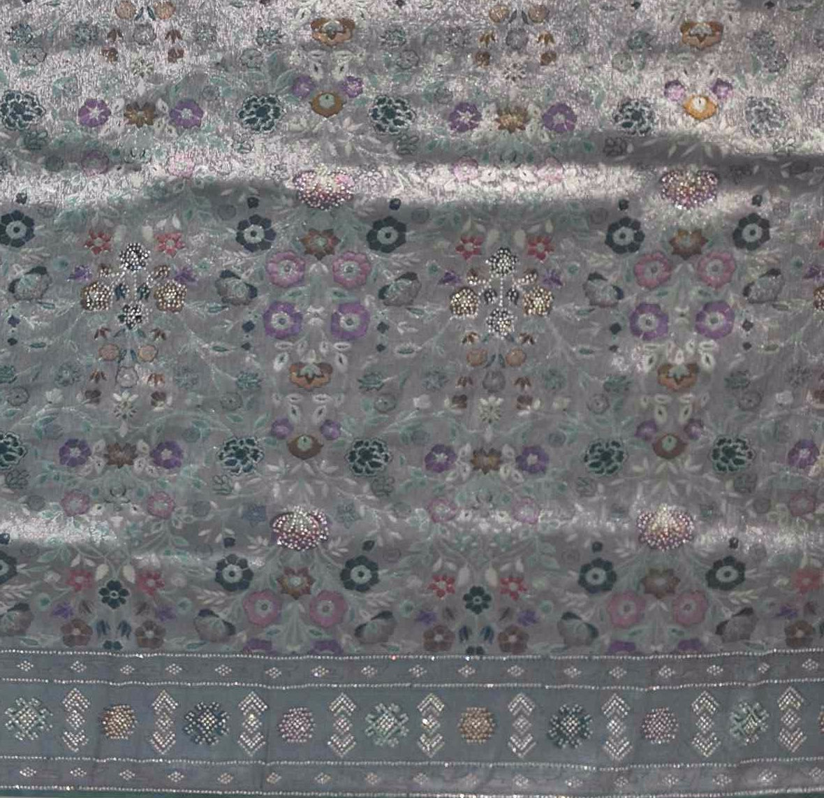 Opulent Silver & Teal Tapestry Saree with Intricate Mosaic Patterns",