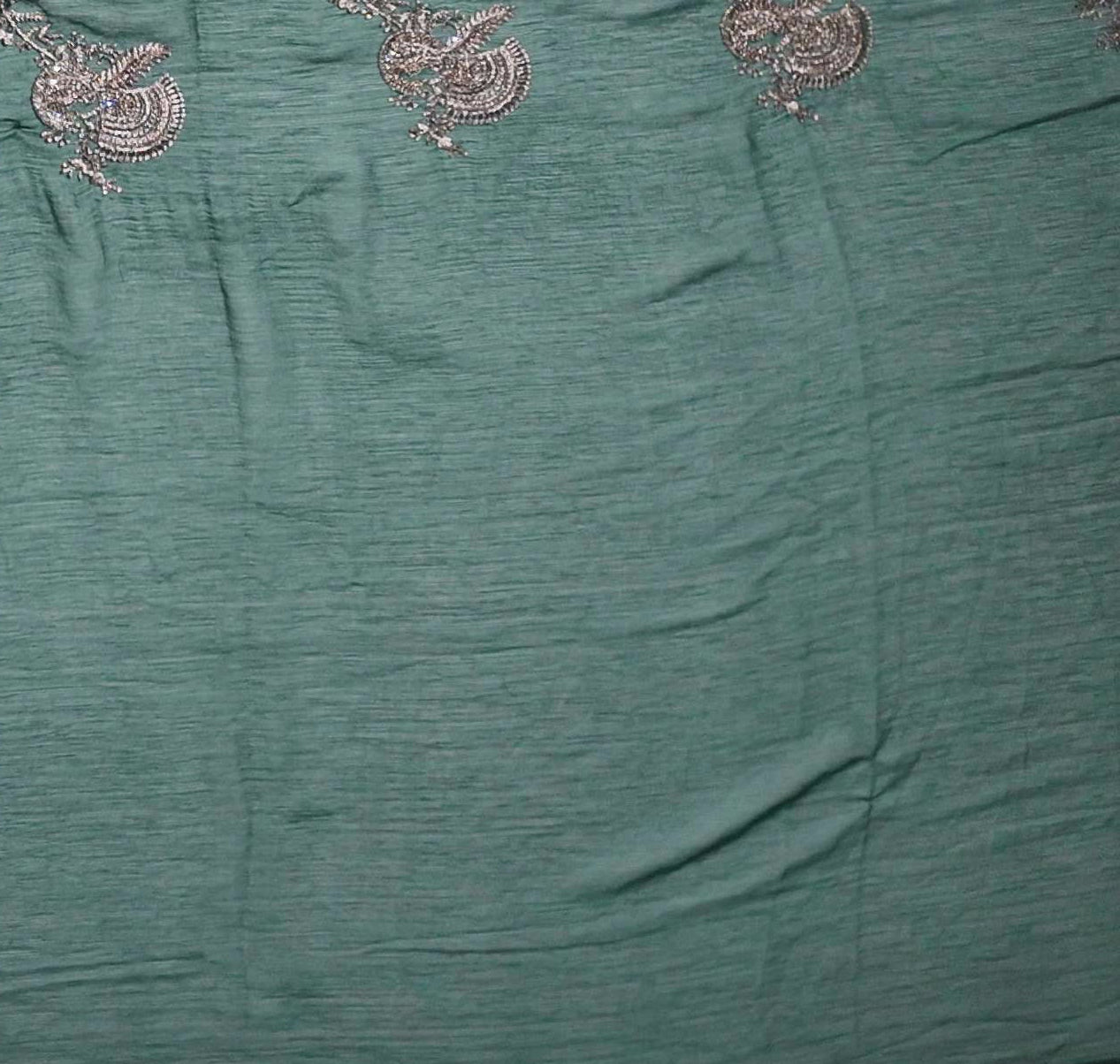 Luxurious Green Embroidered Saree with Peacock Motifs",