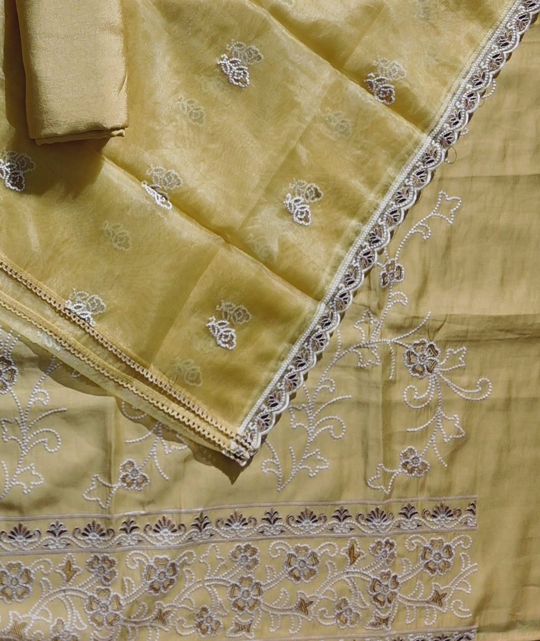 Sun-Kissed Charm: Exquisite Floral Embroidered Unstitched Suit",