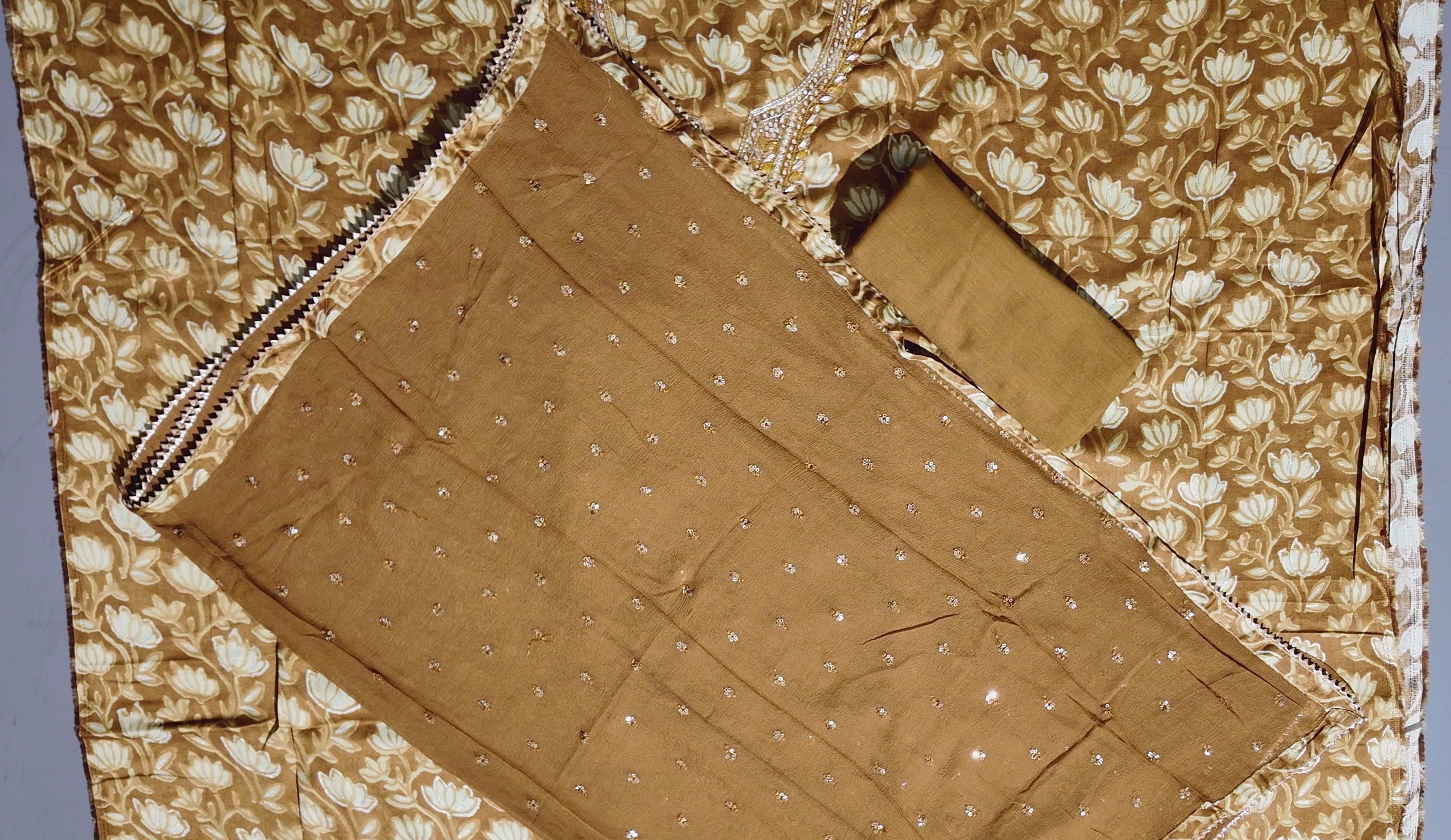 Golden Blossom Unstitched Suit: Embrace Elegant Embroidery",