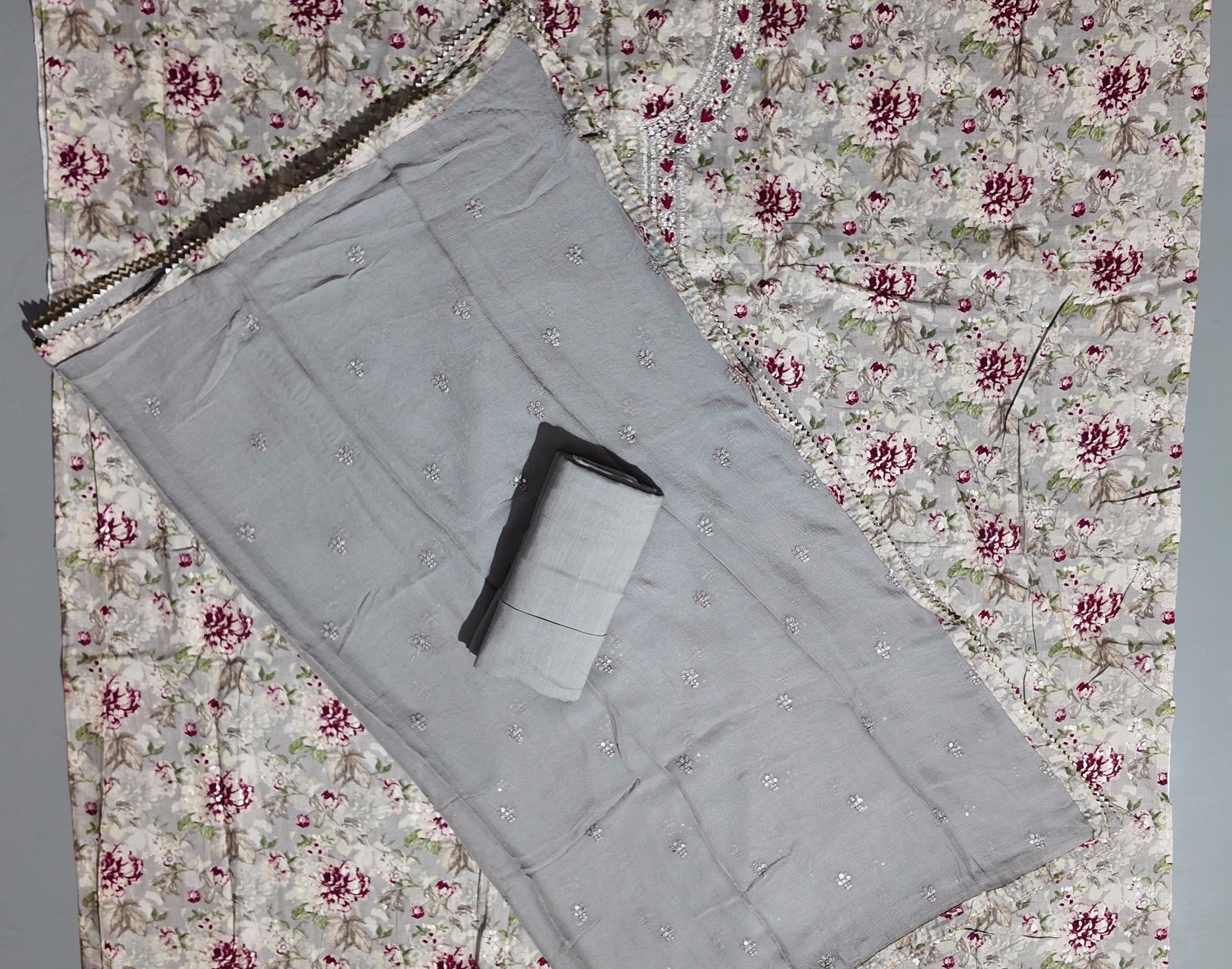 Charming Floral Unstitched Suit with Shimmer Detail",