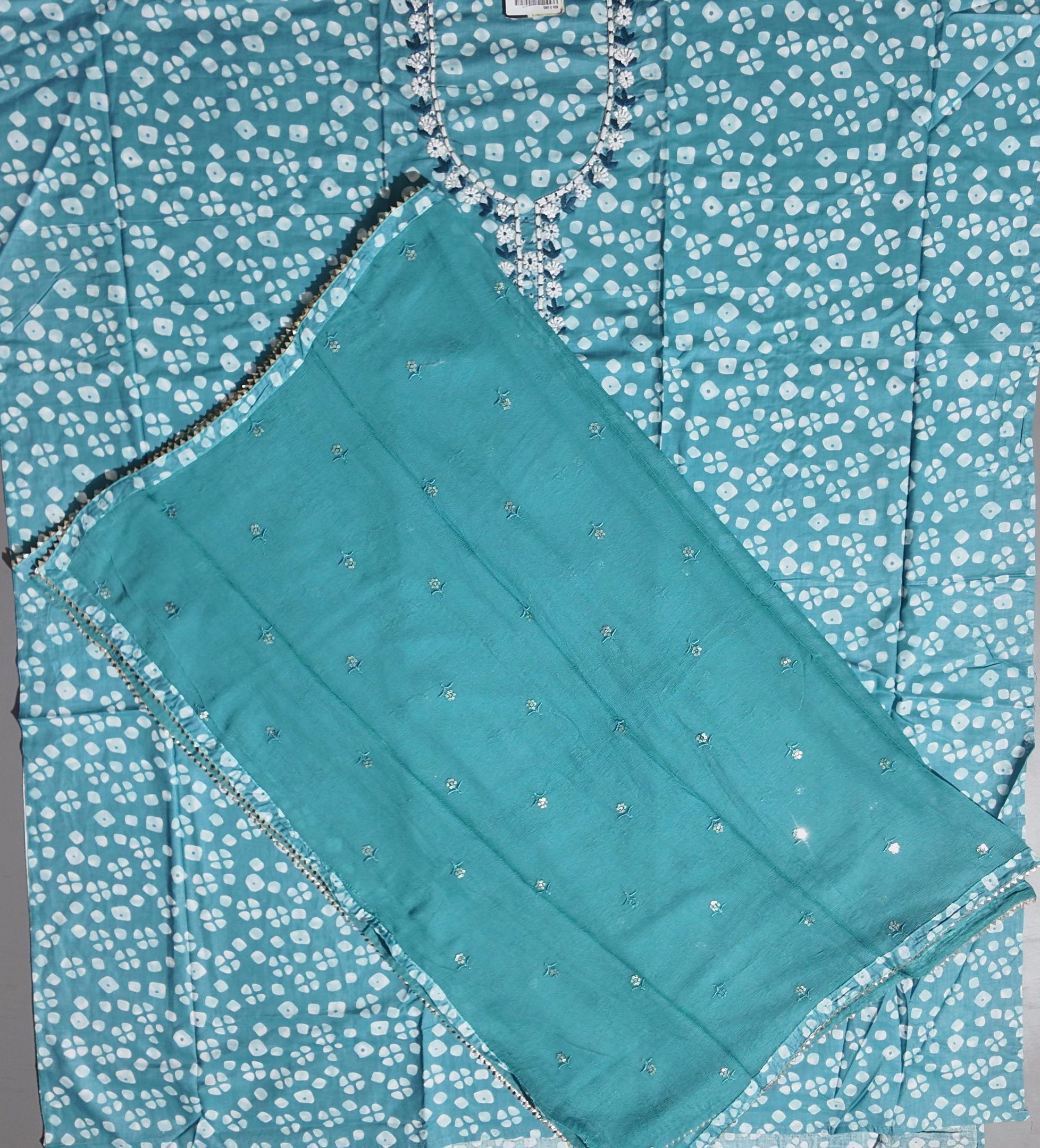 Aqua Blossoms: Unstitched Suit with Floral Embroidered Charm",