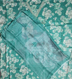 Serene Aqua Blossoms: Unstitched Suit with Intricate Lace