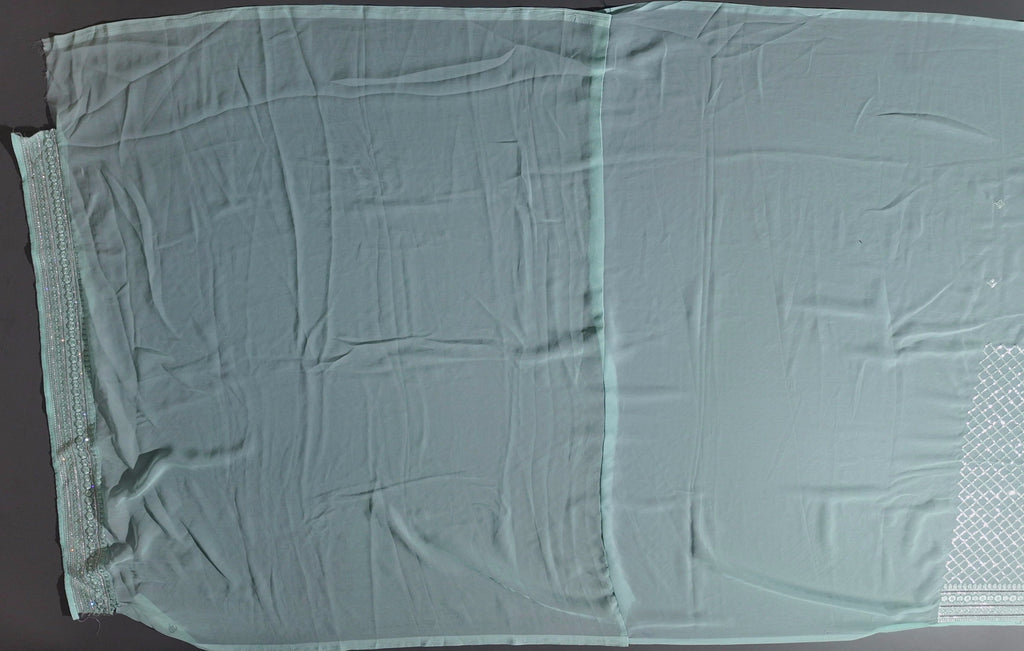 Mint Grace: Artfully Crafted Unstitched Suit Fabric",