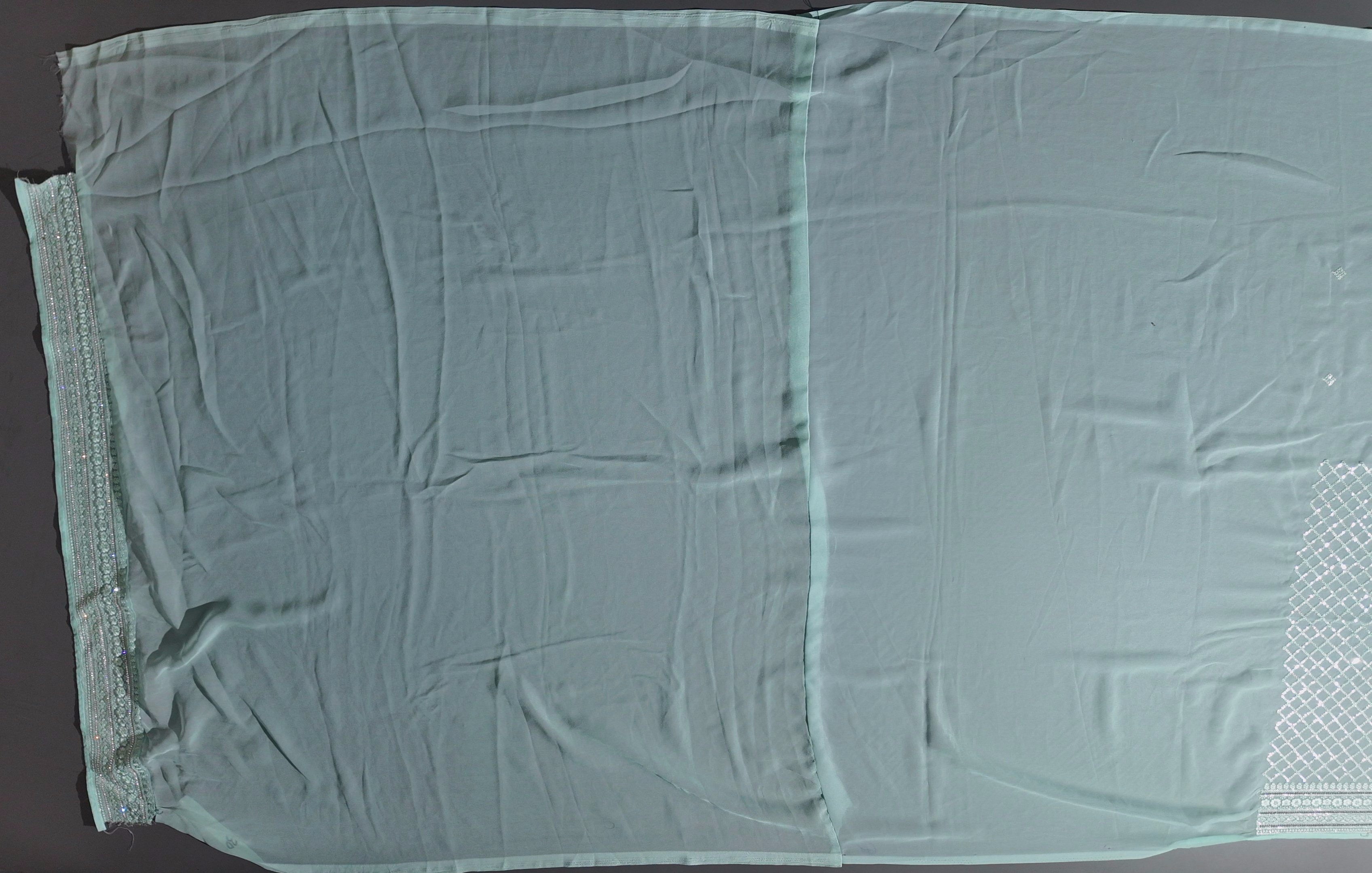 Mint Grace: Artfully Crafted Unstitched Suit Fabric",