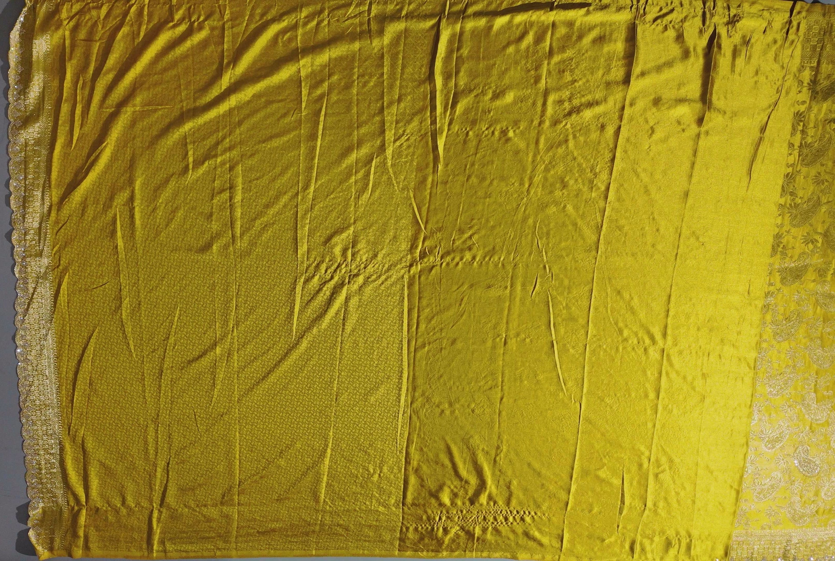 Golden Aura Unstitched Suit: Radiate Glamour on Festive Days",