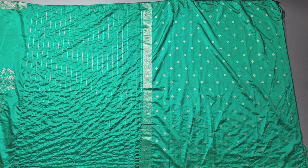 Opulent Floral Unstitched Suit in Vibrant Teal",