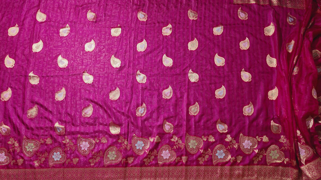 Blossom Aura: Radiant Red Silk Saree with Intricate Floral Motifs",
