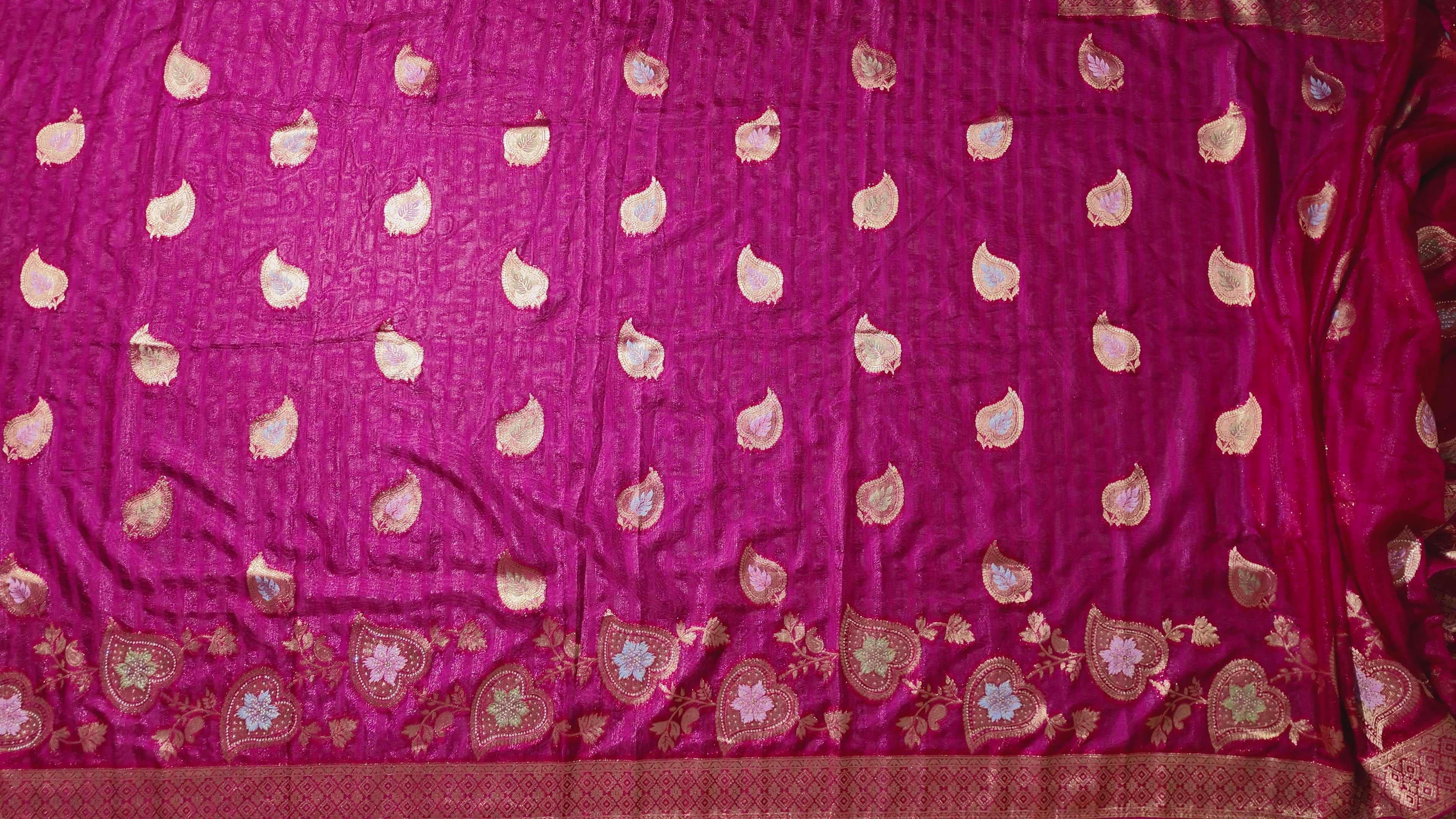 Blossom Aura: Radiant Red Silk Saree with Intricate Floral Motifs",