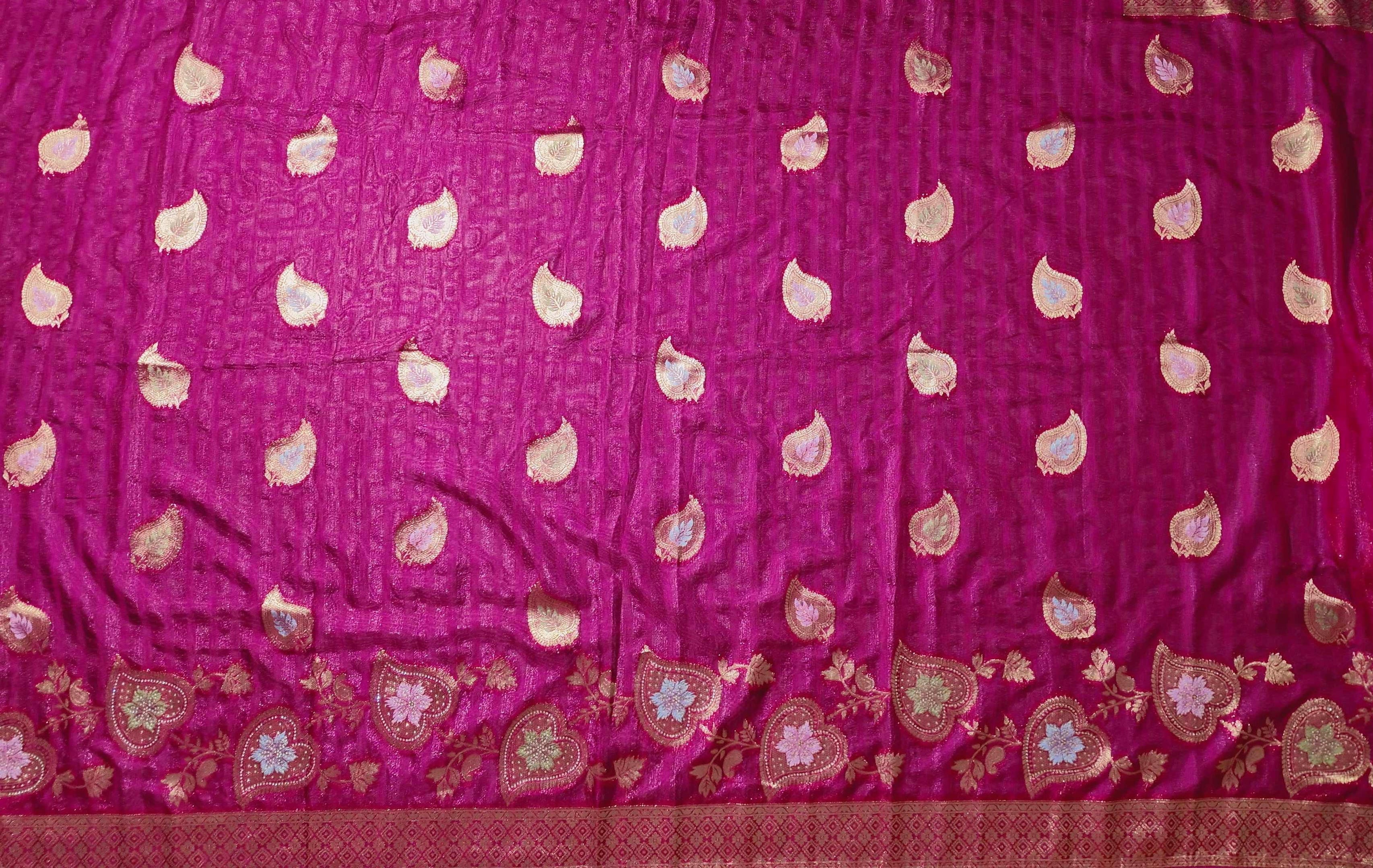 Opulent Ruby Red Saree with Intricate Golden Embroidery",