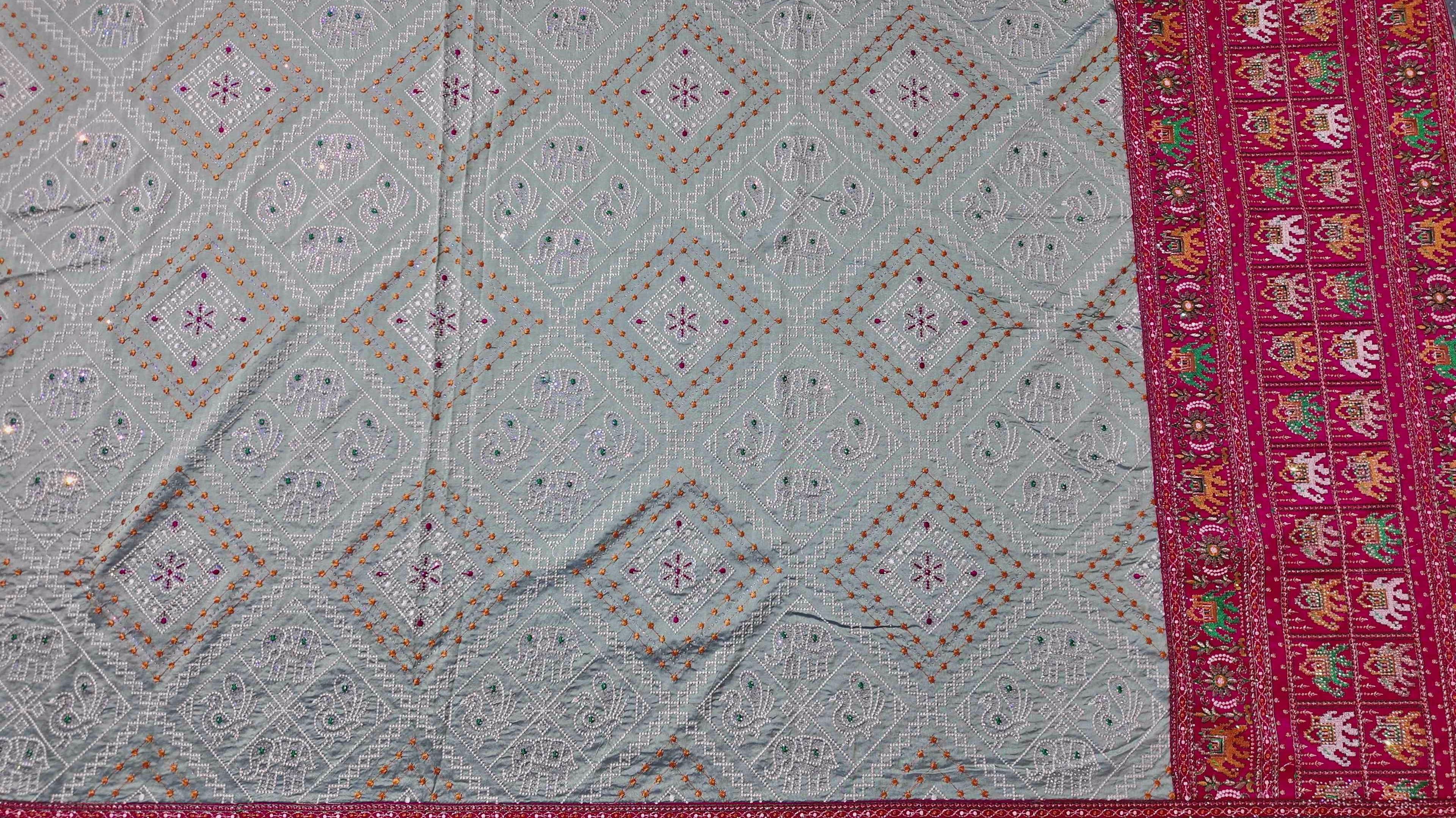 Festive Radiance: Vibrant Embroidered Silk Saree",