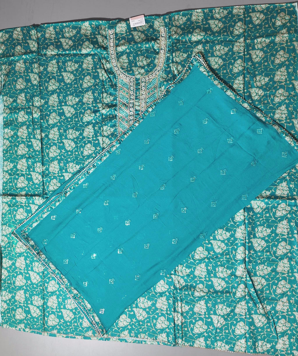 Opulent Teal Brocade Unstitched Suit with Intricate Embellishments
