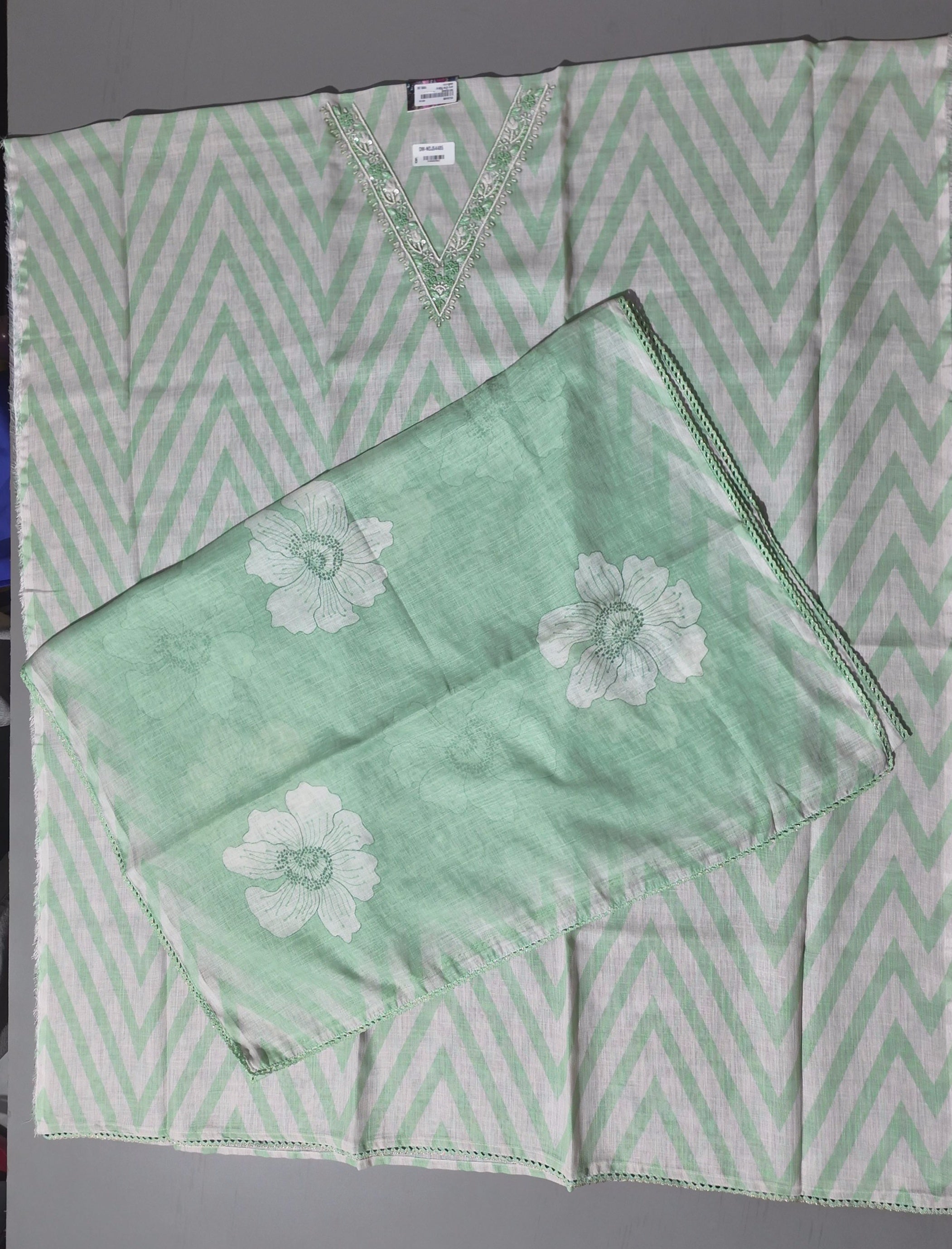 Timeless Charm: Mint Green Unstitched Suit with Embroidered Elegance