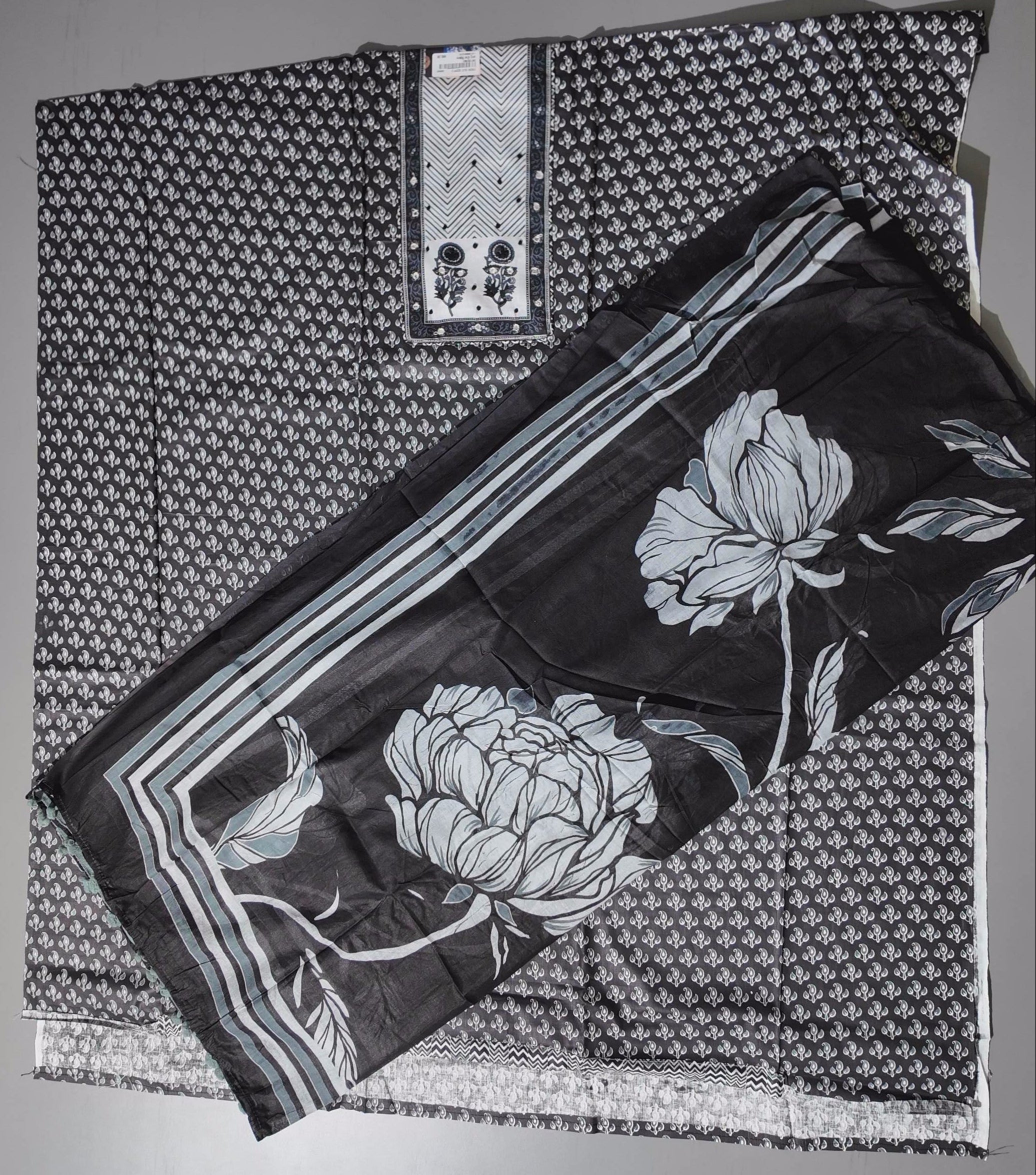 Monochrome Majestic: Unstitched Ensemble with Intricate Floral Designs