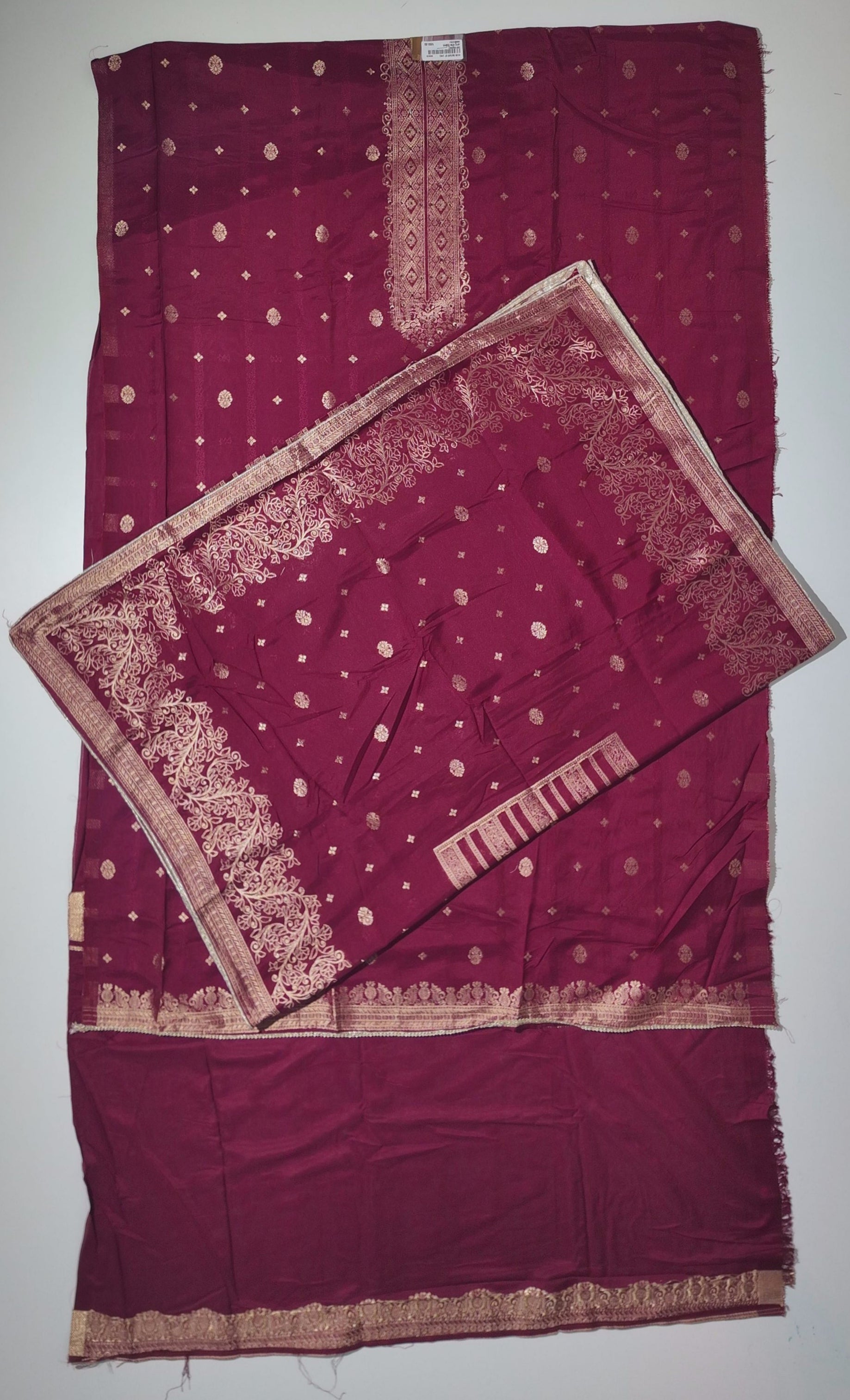 Rich Maroon Unstitched Suit with Intricate Ethnic Patterns
