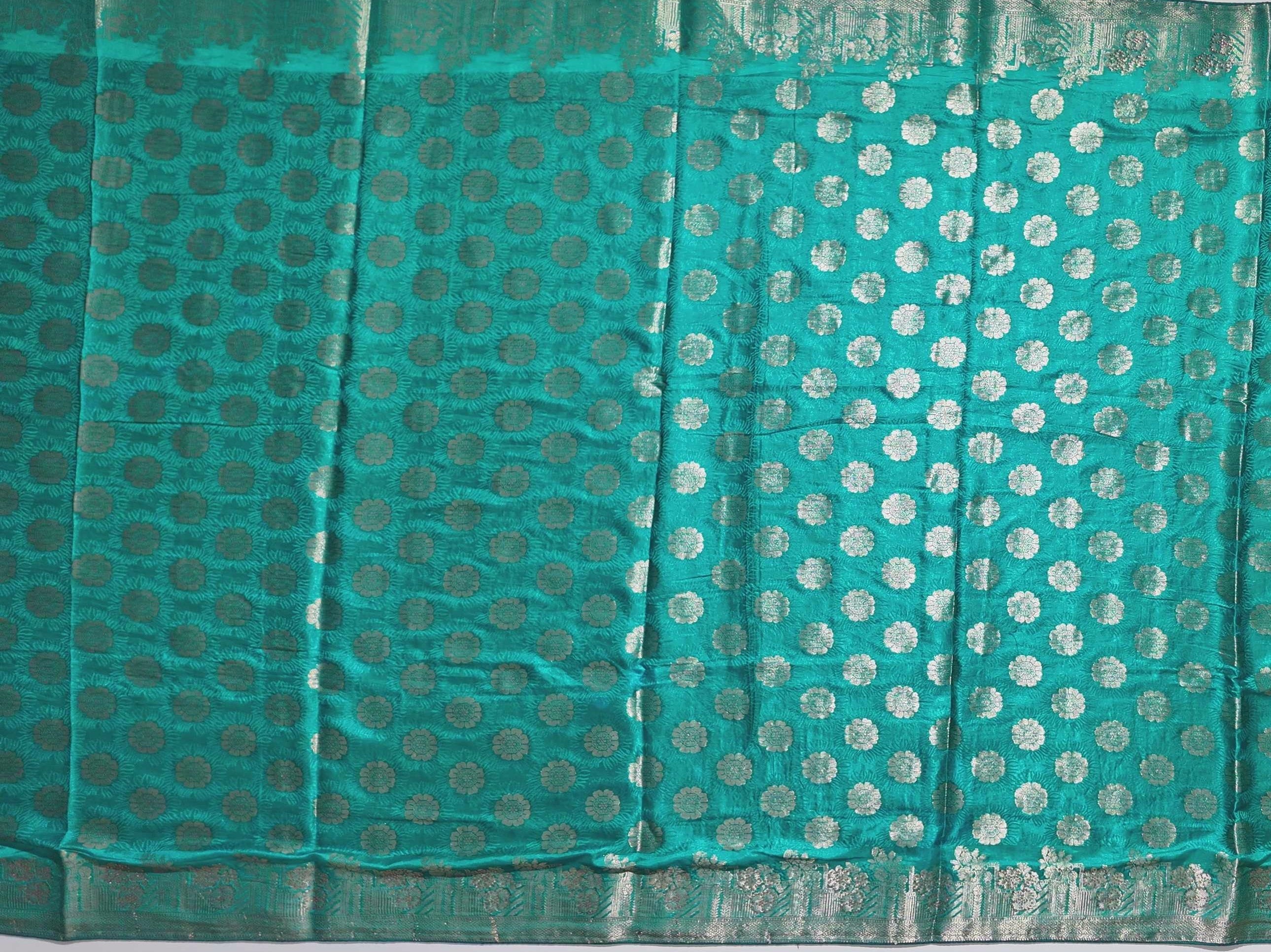 Teal Radiance: Handcrafted Banarasi Silk Saree",