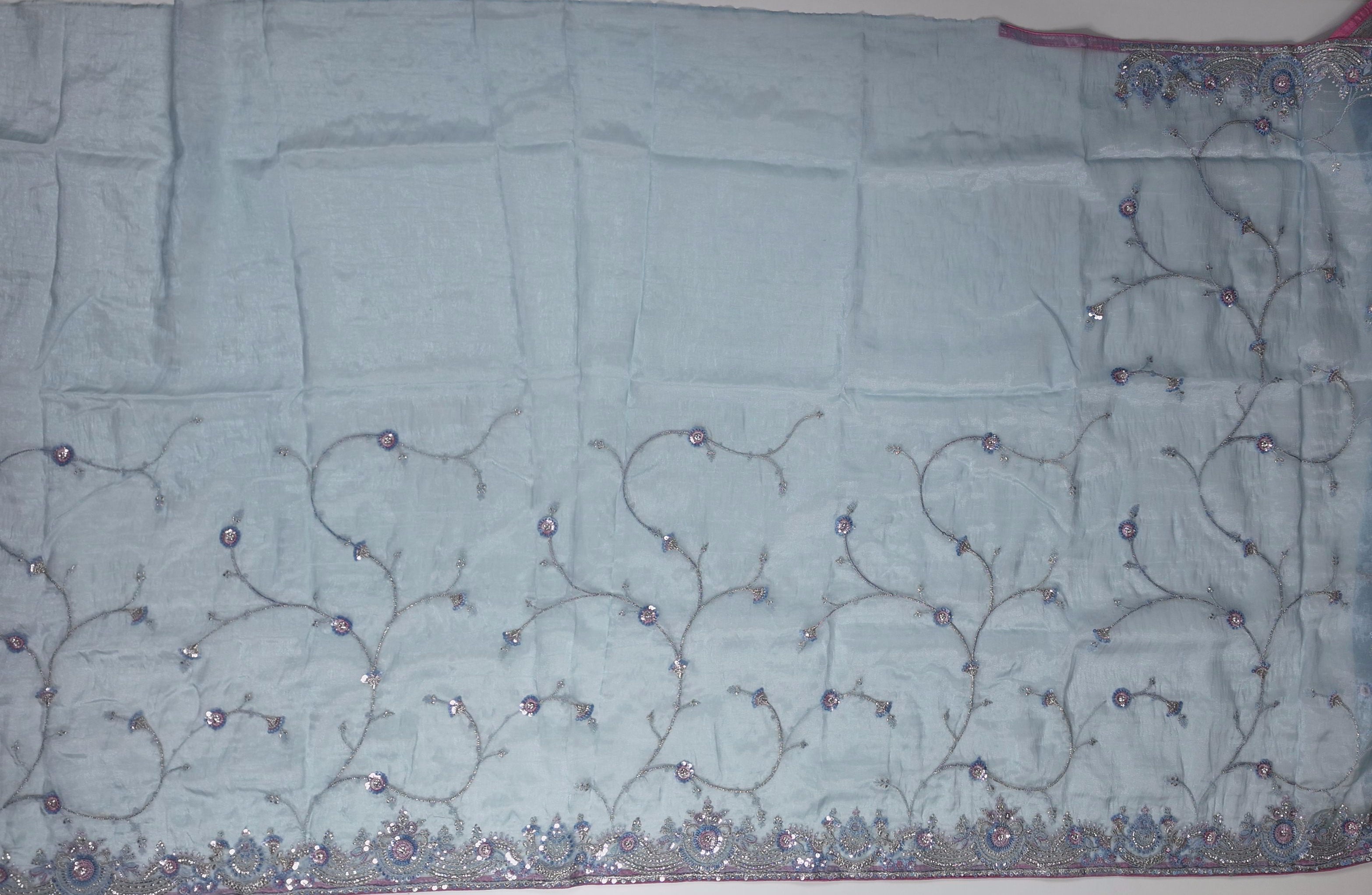 Whispering Silver Blossom Embroidered Saree",